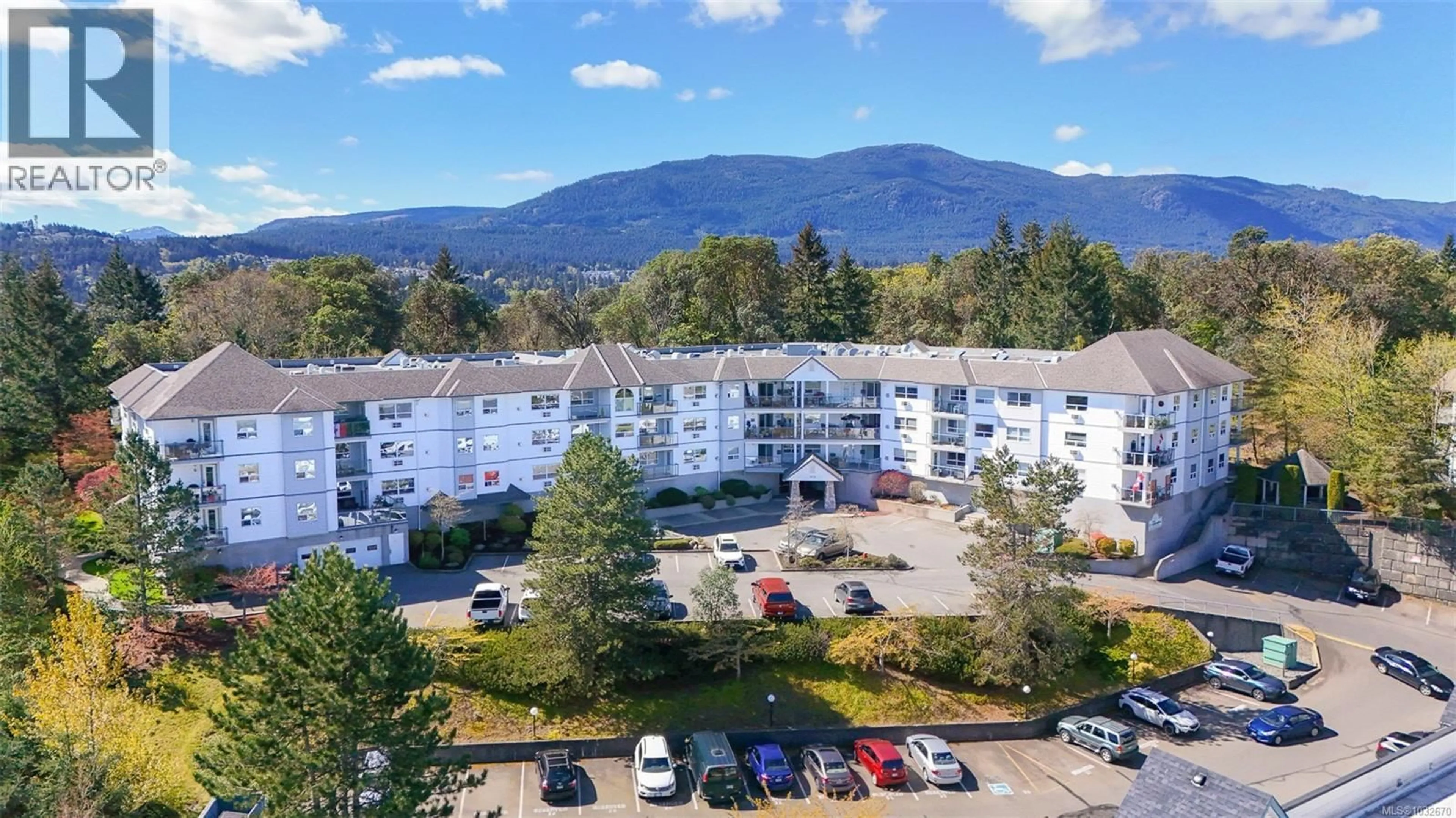 A pic from outside/outdoor area/front of a property/back of a property/a pic from drone, mountain view for 213 - 1633 DUFFERIN CRESCENT, Nanaimo British Columbia V9S5T7