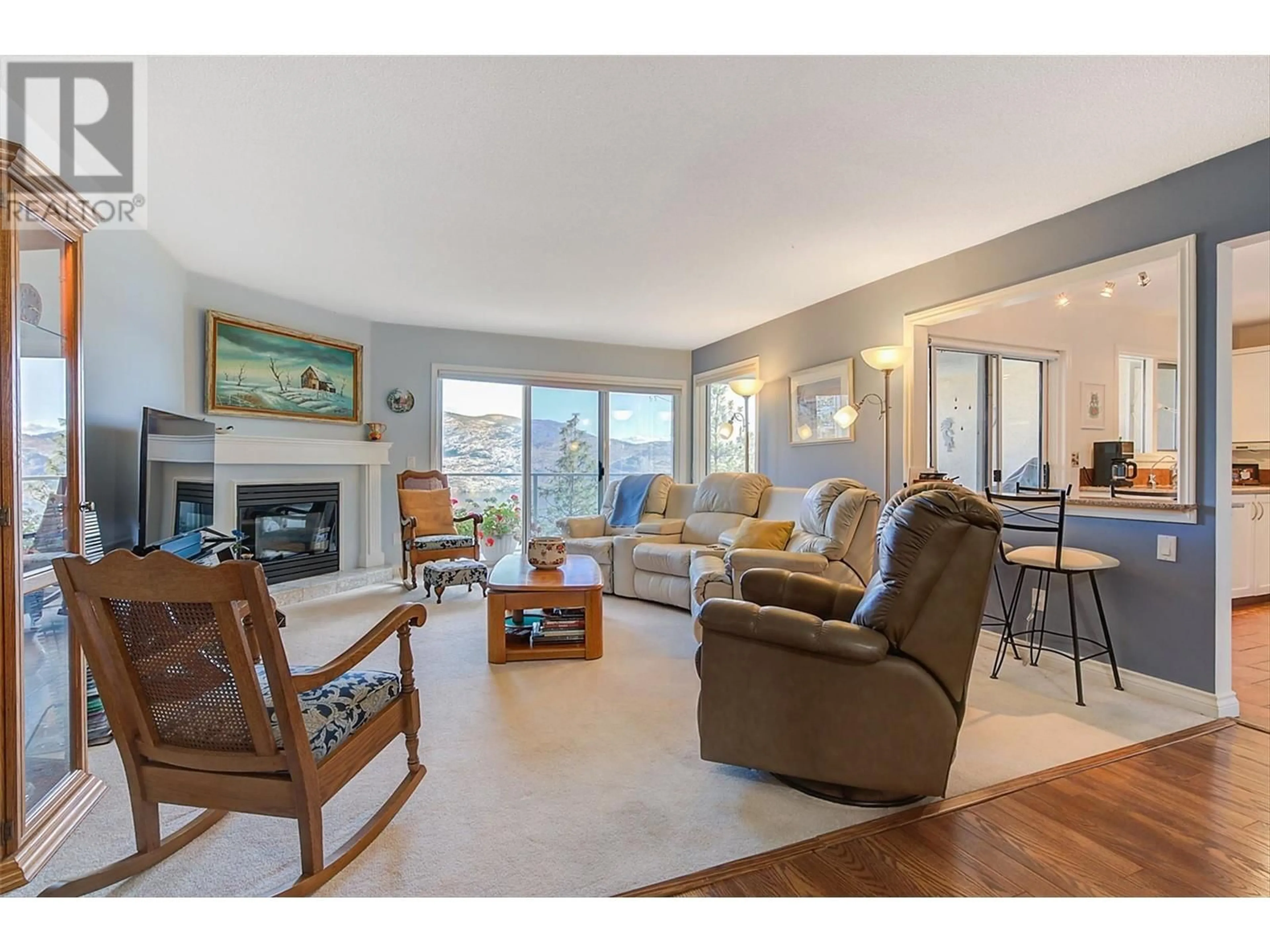 Living room, wood floors for 4470 Ponderosa Drive Unit# 103, Peachland British Columbia V0H1X5