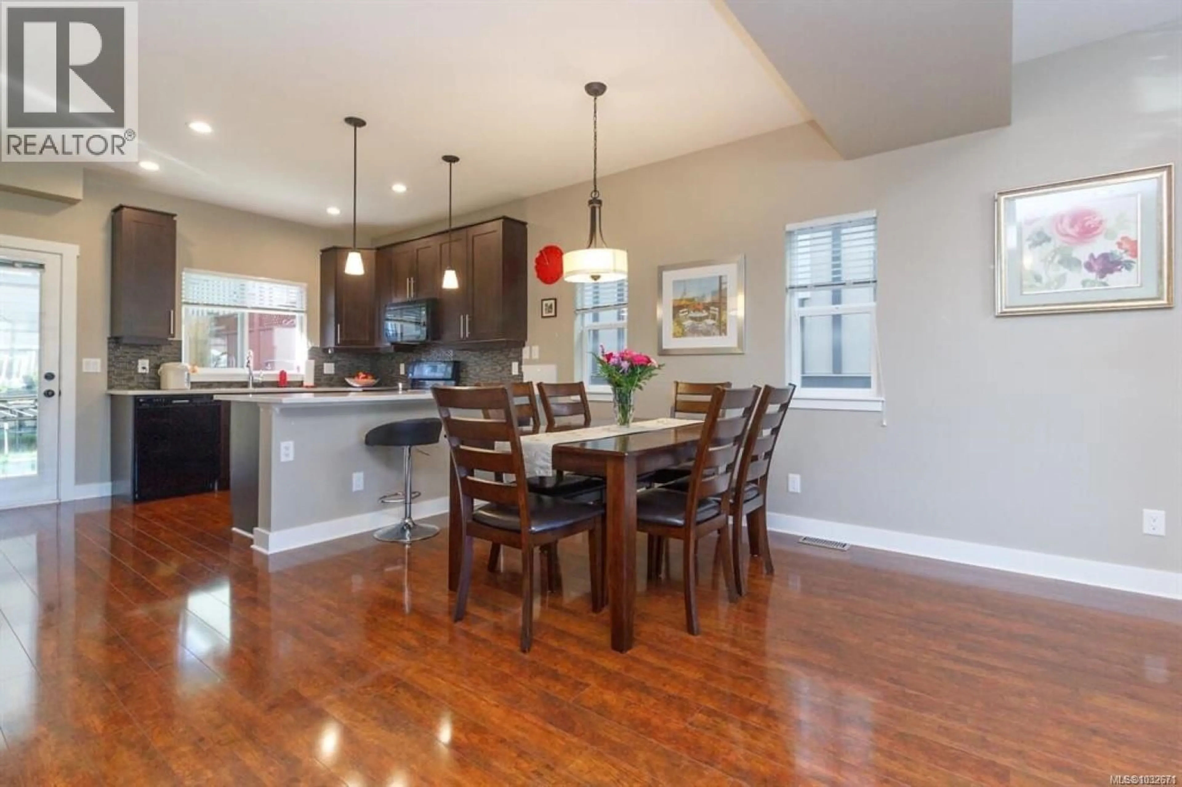 Open concept kitchen, wood/laminate floor for 1227 FRESHWATER CRESCENT, Langford British Columbia V9B0L9