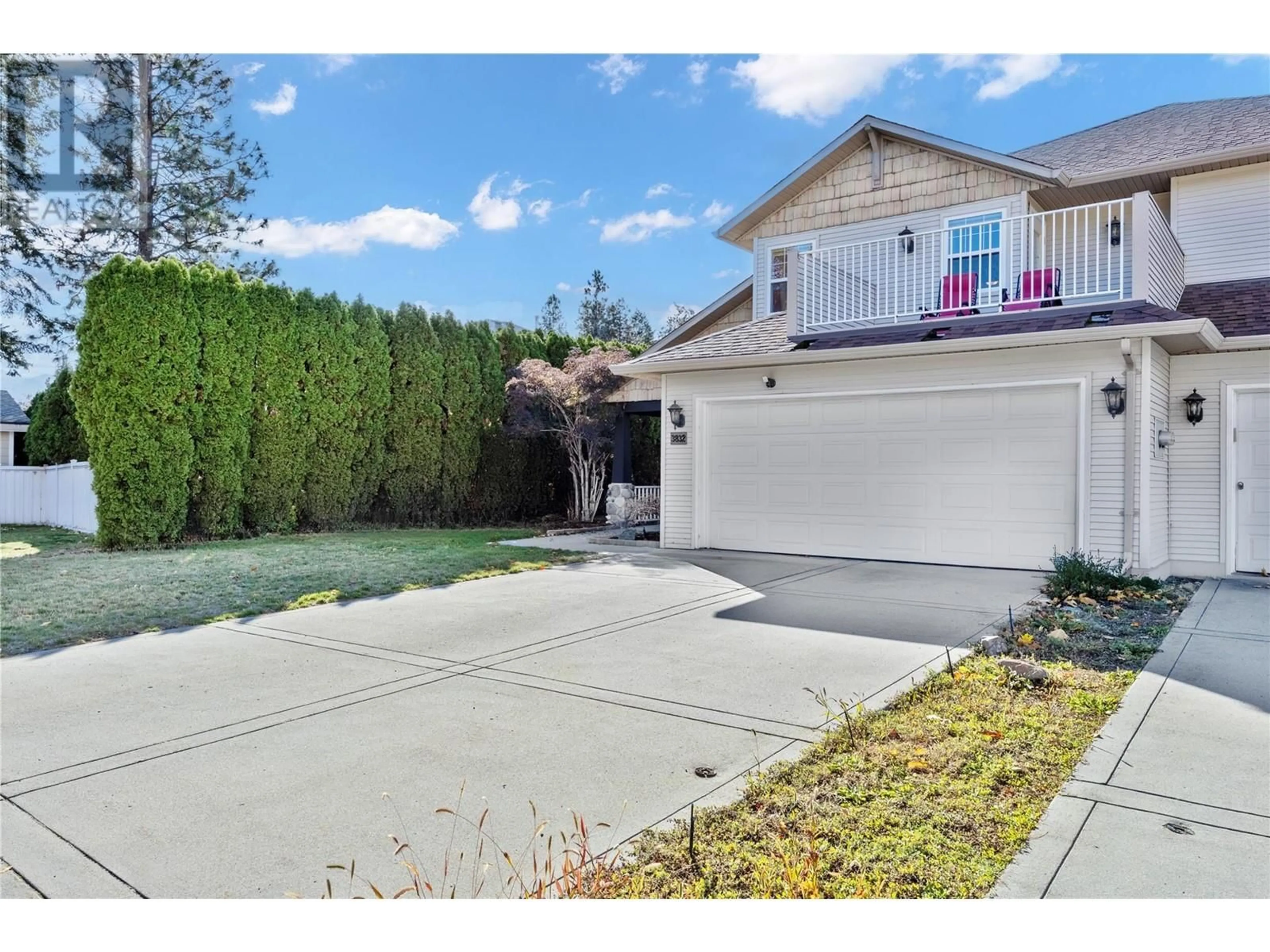 Frontside or backside of a home, the fenced backyard for 3832 Glen Canyon Drive, West Kelowna British Columbia V4T2P7