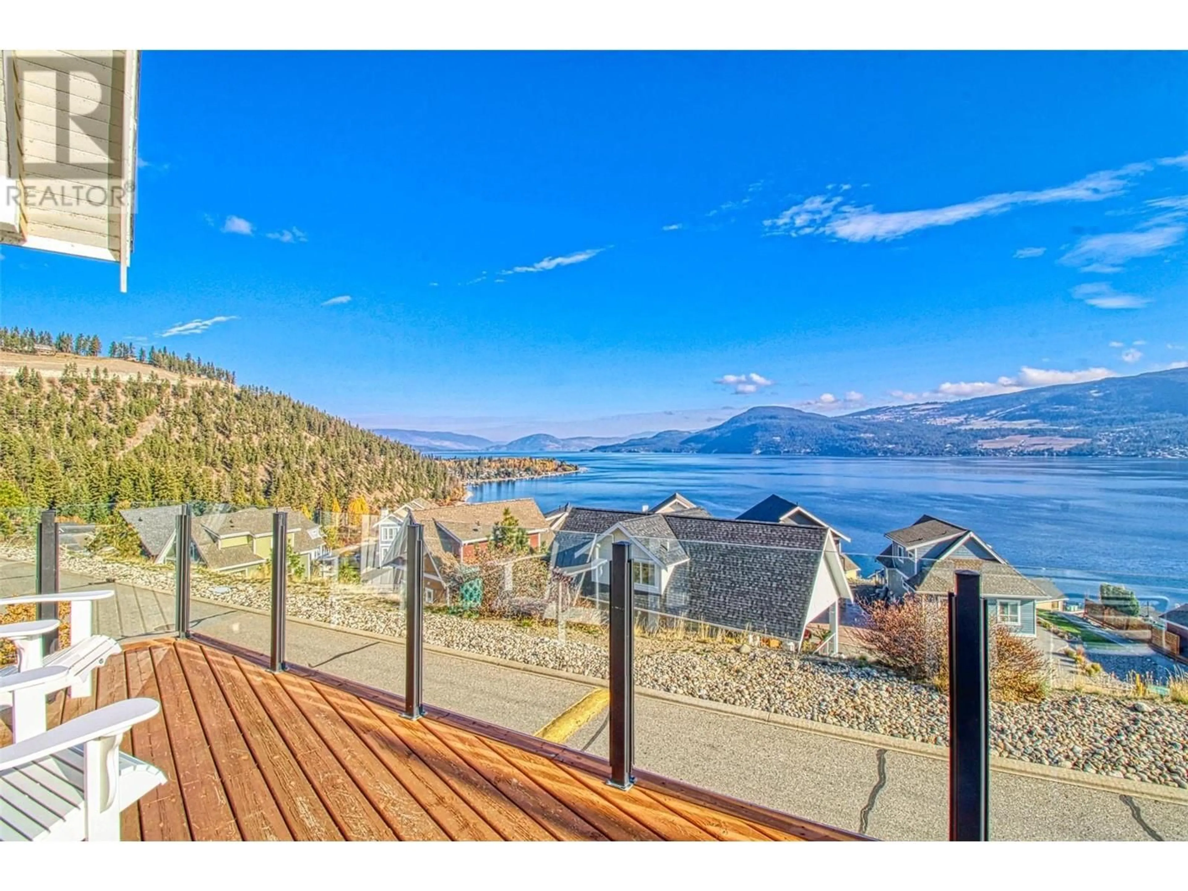 A pic from exterior of the house or condo, lake for 6897 Santiago Loop Unit# 100, Kelowna British Columbia V1Z3R8