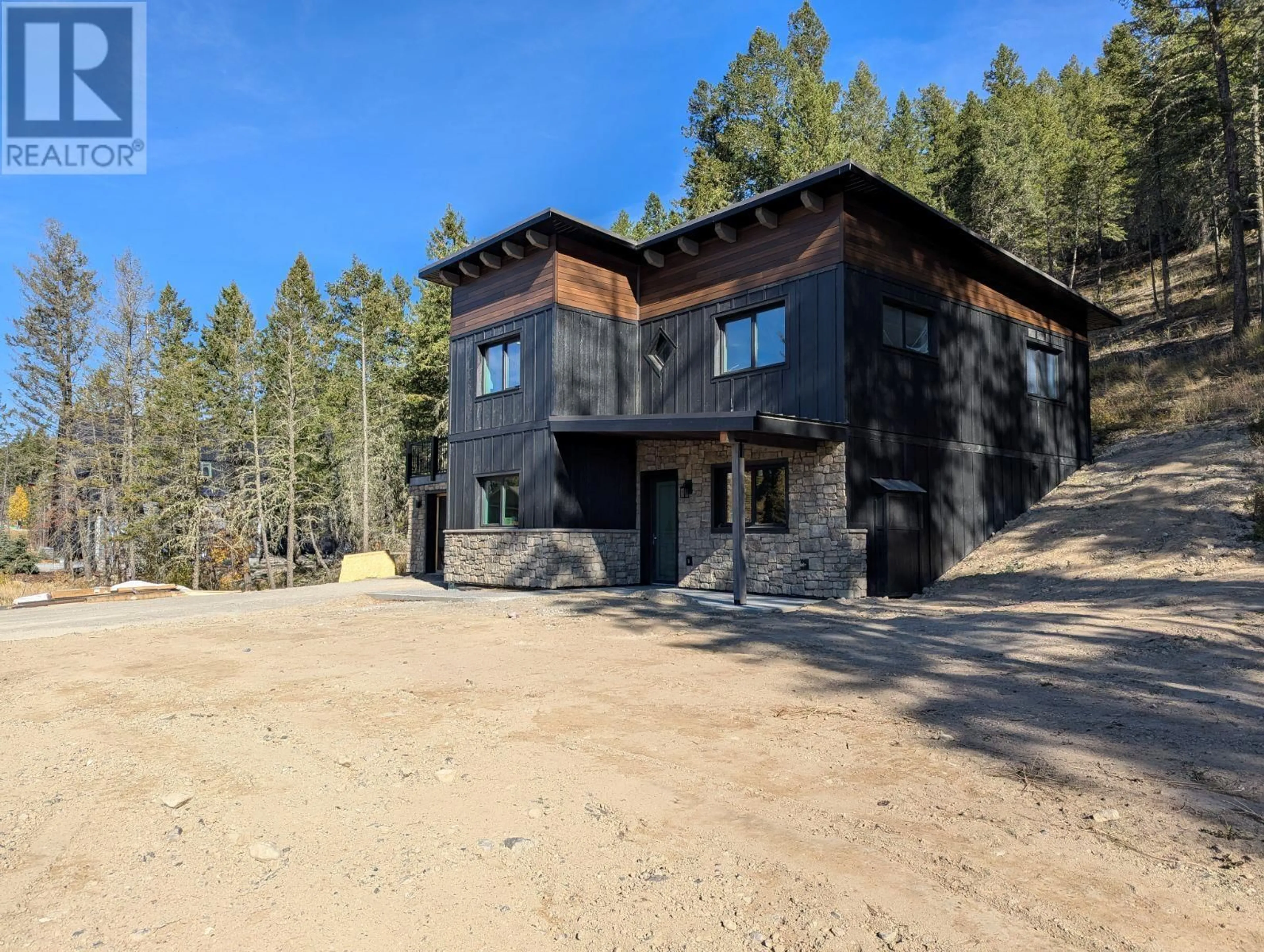 Frontside or backside of a home, the front or back of building for 4834 MOUNTAIN VIEW Drive, Fairmont Hot Springs British Columbia V0B1L1