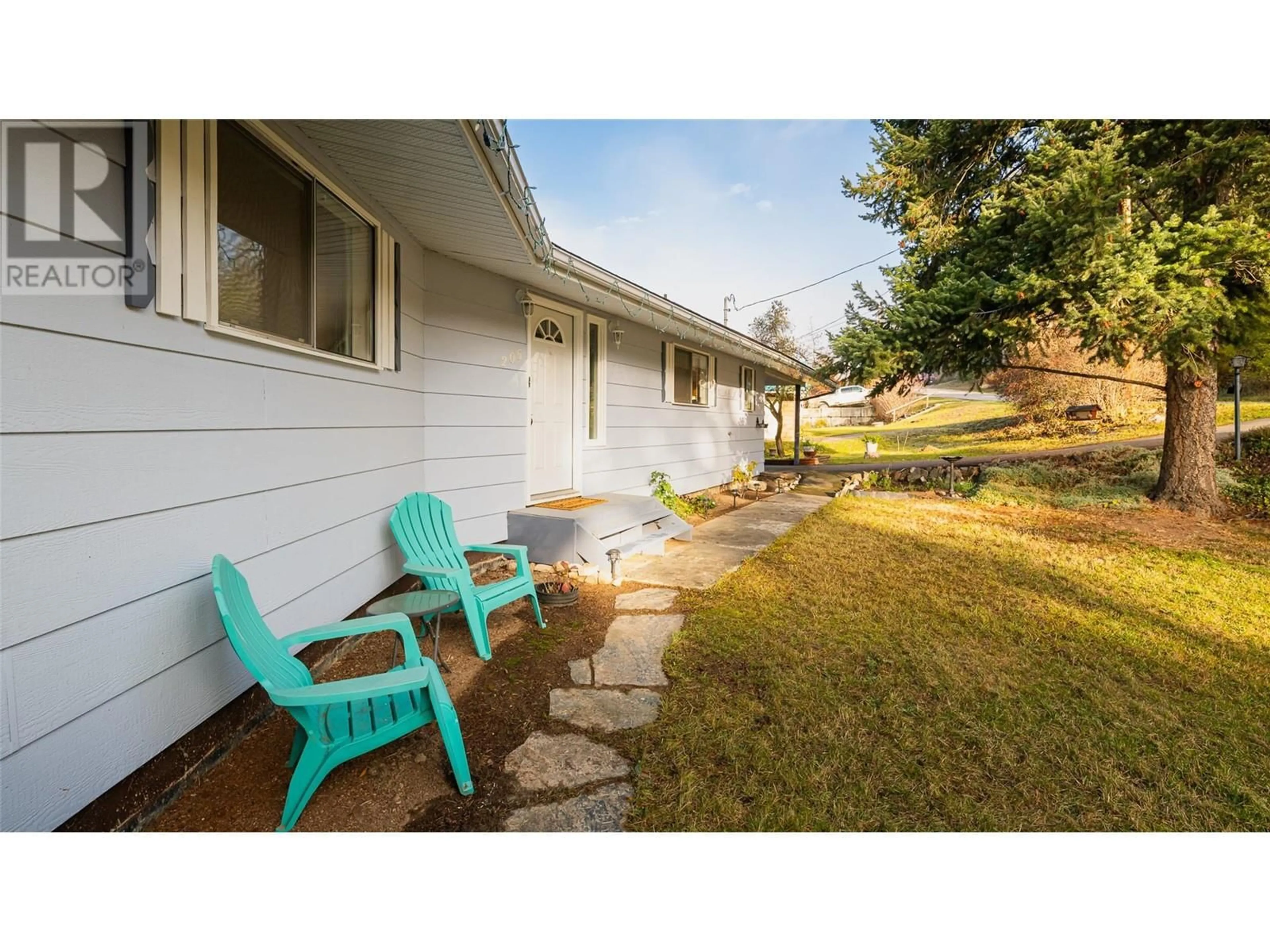 Patio, the fenced backyard for 205 5th Avenue N, Creston British Columbia V0B1G3