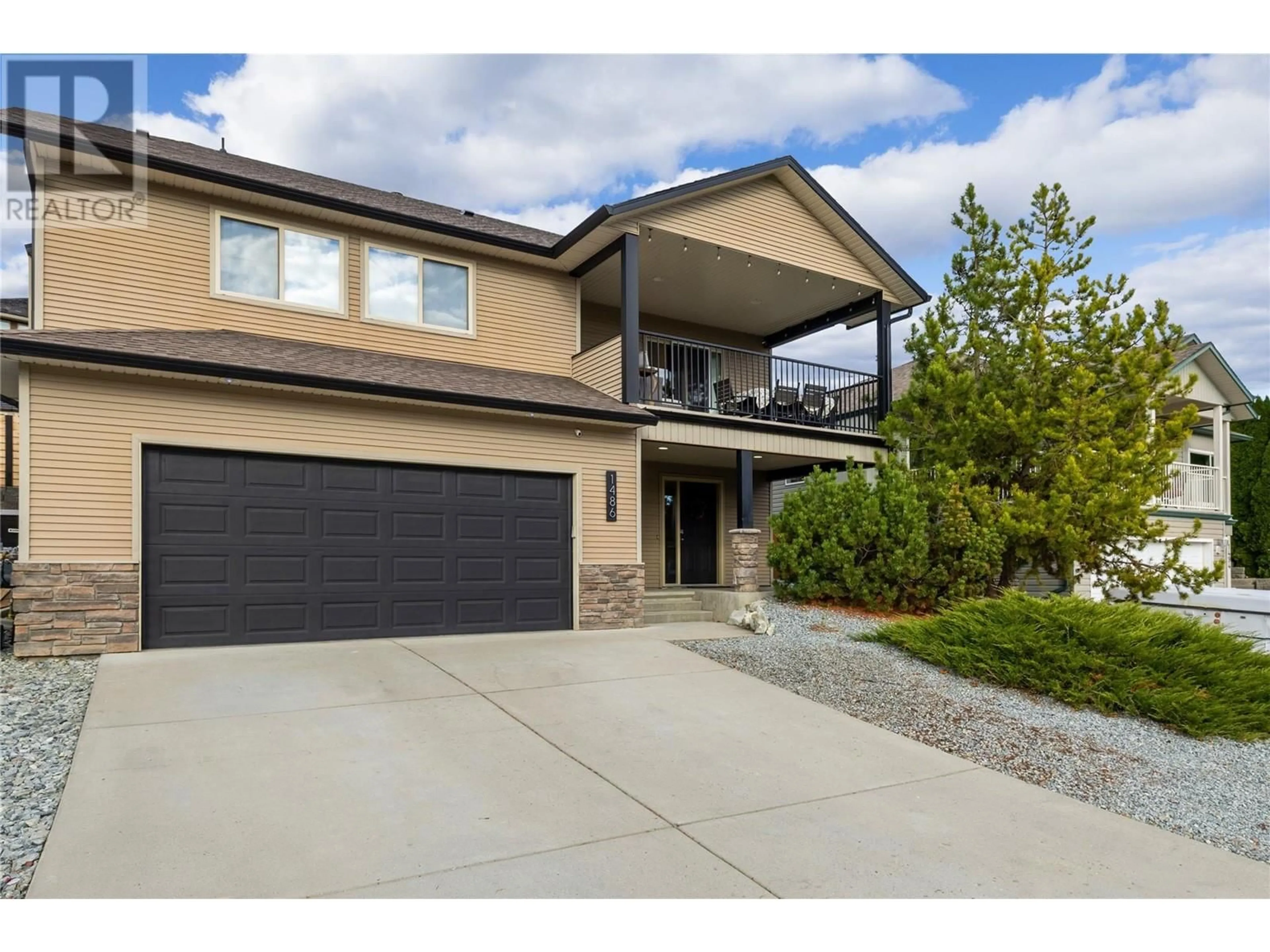 Frontside or backside of a home, the street view for 1486 Wilmot Avenue, Kelowna British Columbia V1P1N3