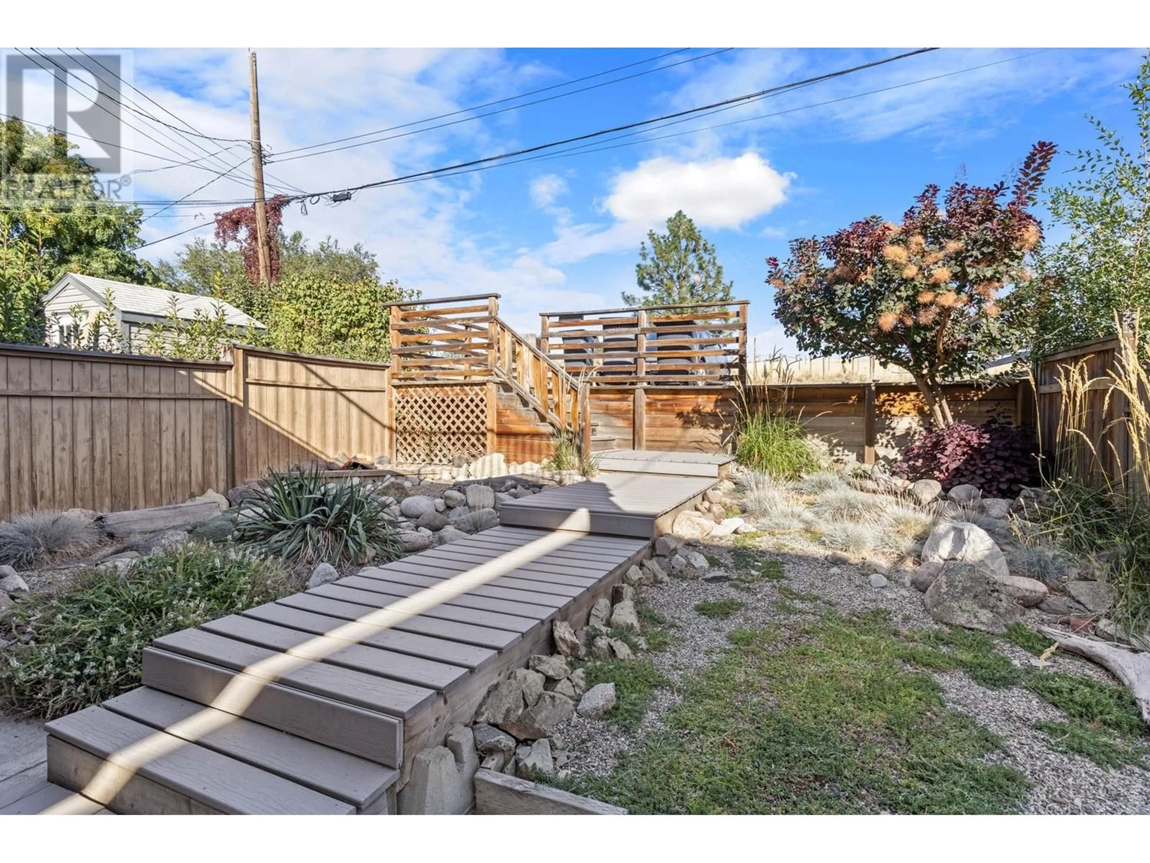 Patio, the fenced backyard for 3758 Wetton Road Unit# B, West Kelowna British Columbia V4T2C1