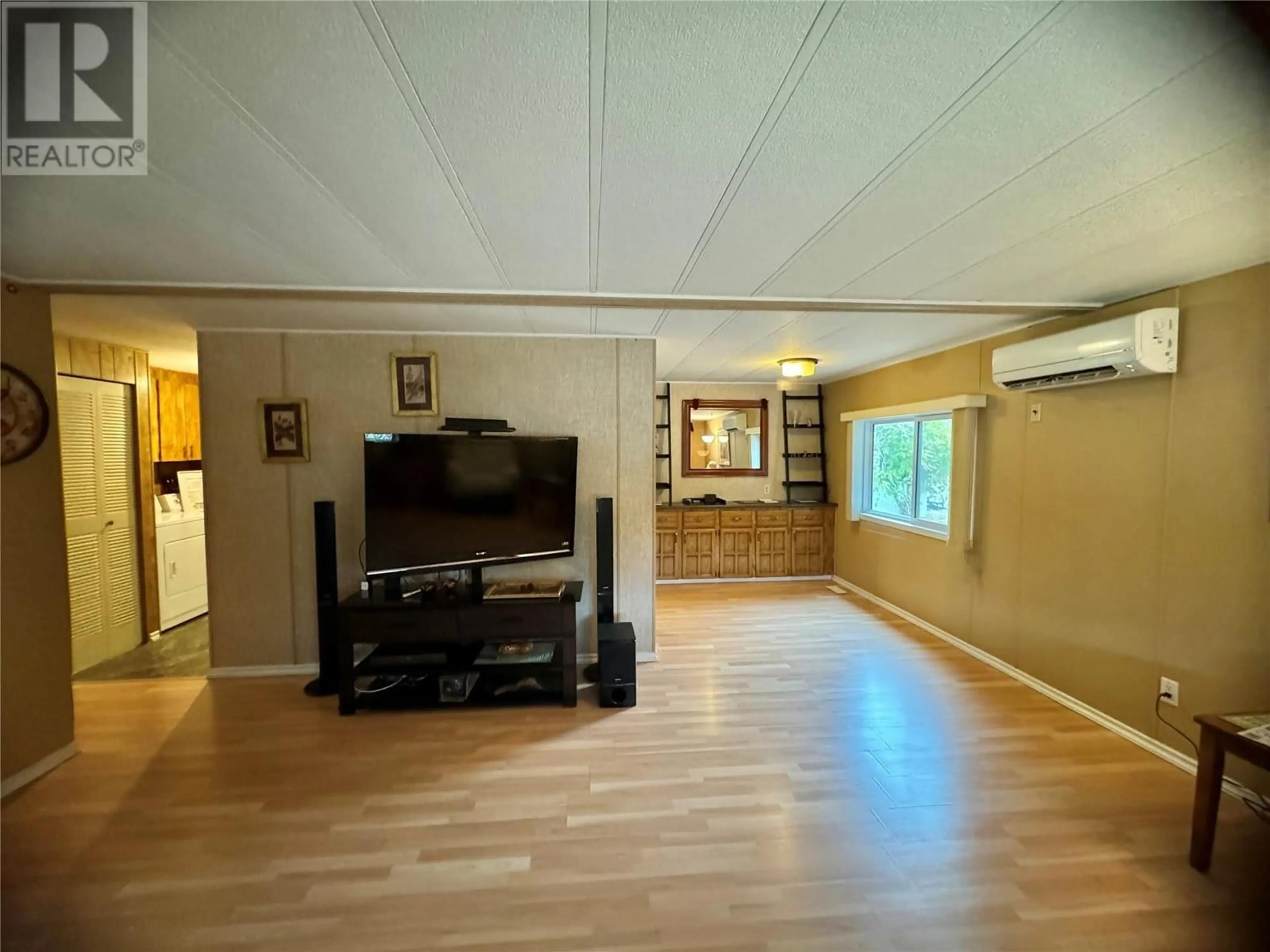 A pic of a room, wood floors for 0 Willow Court Unit# 12B  146, Oliver British Columbia V0H1T2