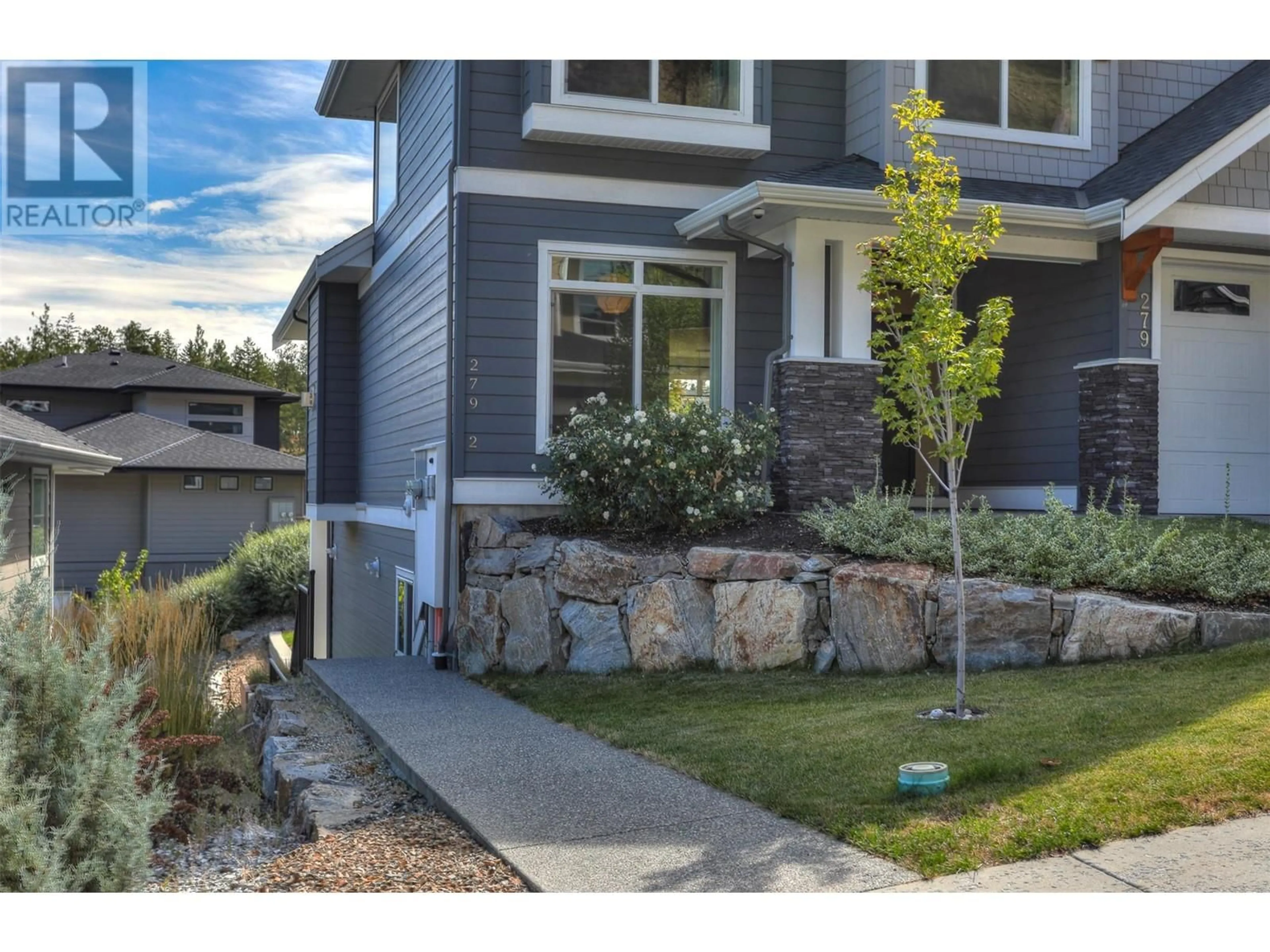 Frontside or backside of a home, the street view for 279 Upper Canyon Drive N, Kelowna British Columbia V1V3C7