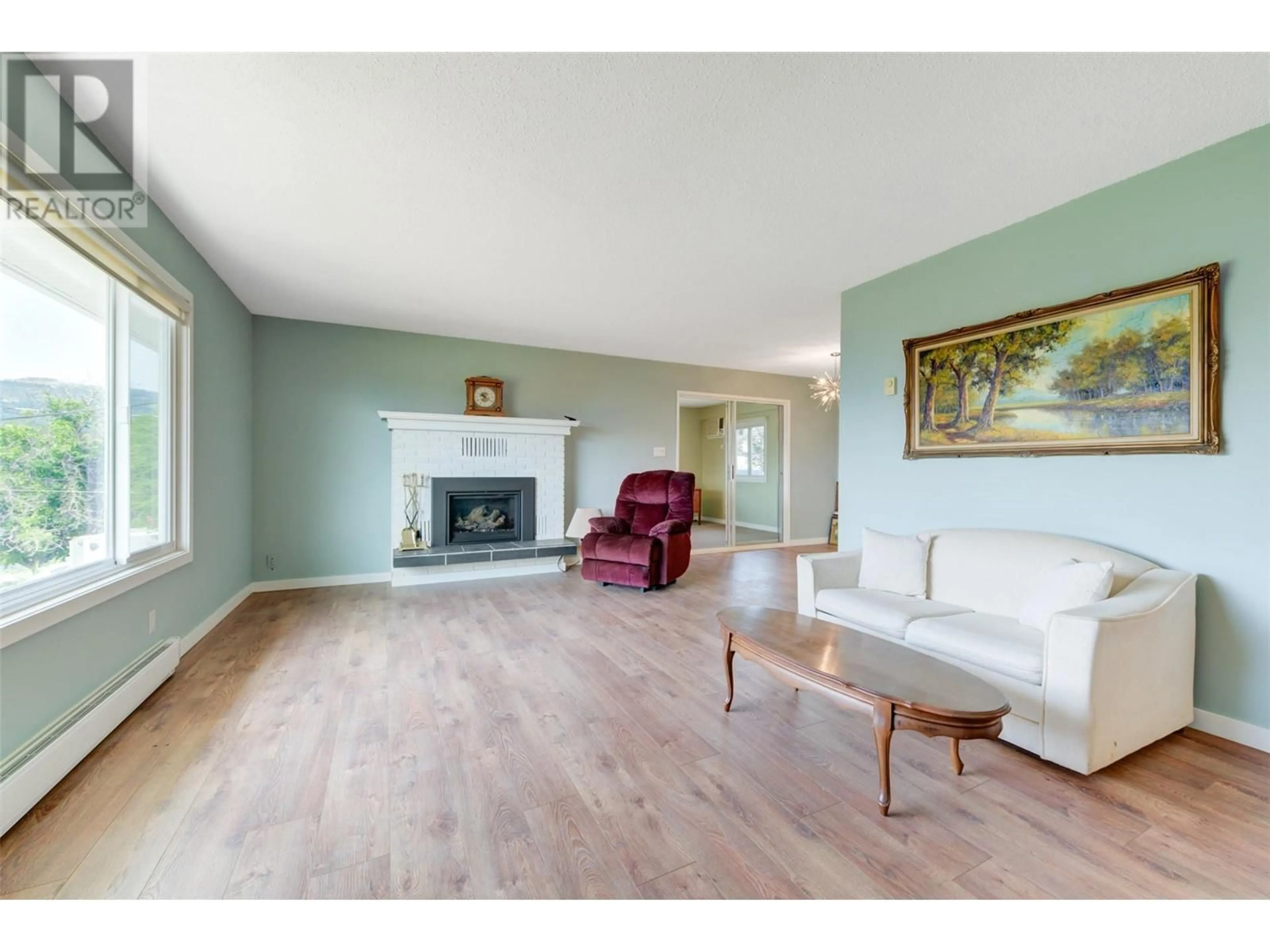 Living room, wood floors for 2472 Smid Road, West Kelowna British Columbia V4T1P1