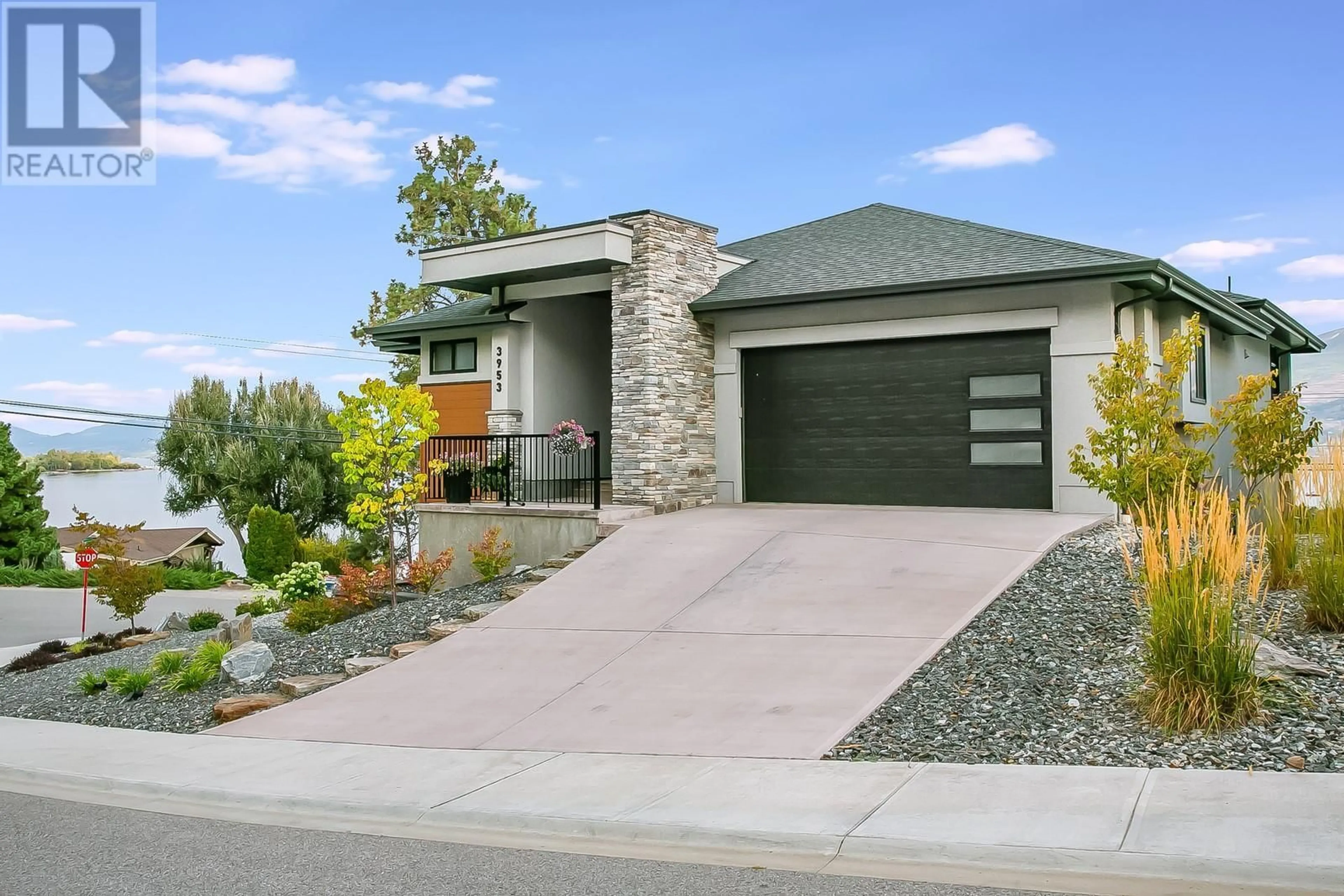 Frontside or backside of a home, the street view for 3953 Beachview Drive, West Kelowna British Columbia V4T2K1