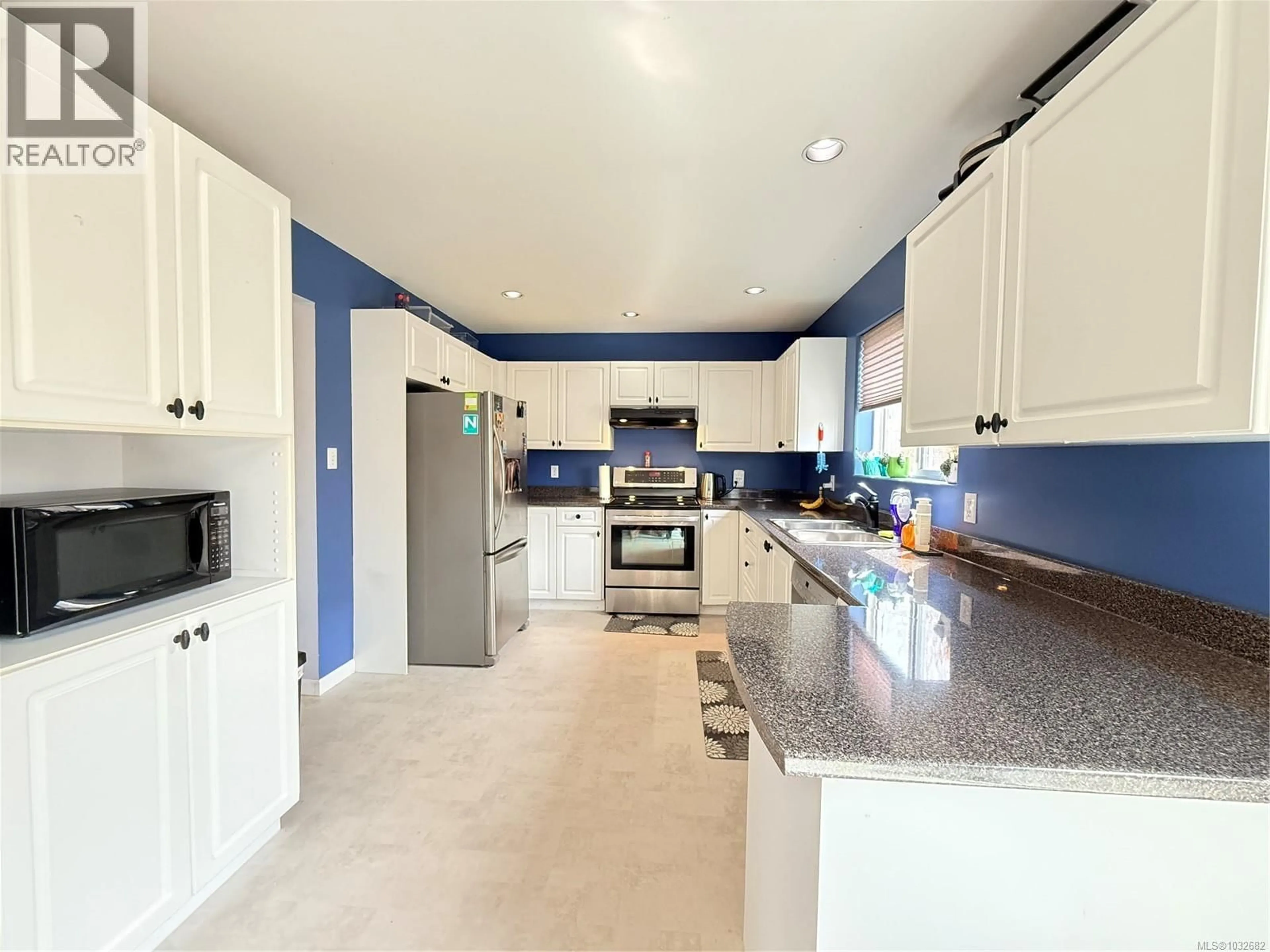 Open concept kitchen, ceramic/tile floor for 2553 KINGCOME PLACE, Port McNeill British Columbia V0N2R0