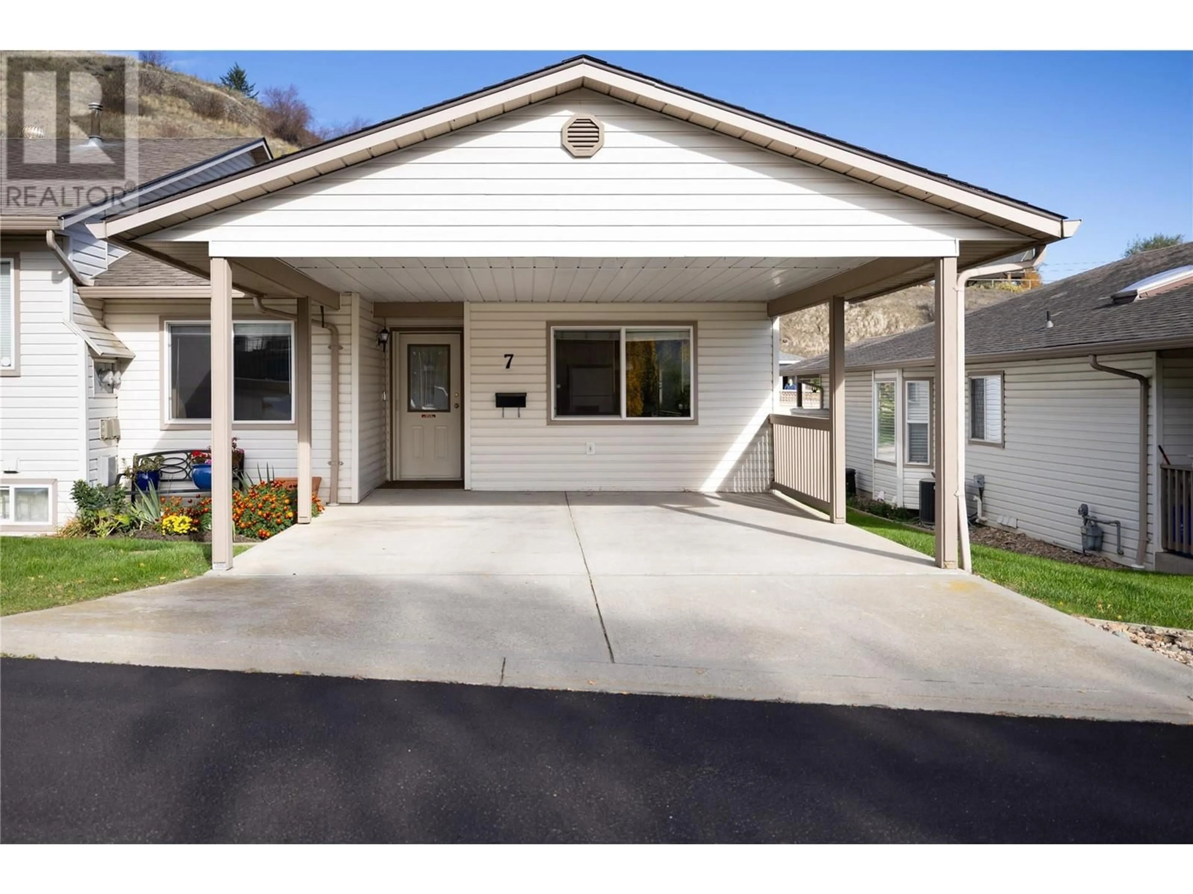 Home with vinyl exterior material, street for 7 - 4210 ALEXIS PARK DRIVE, Vernon British Columbia V1T6H3