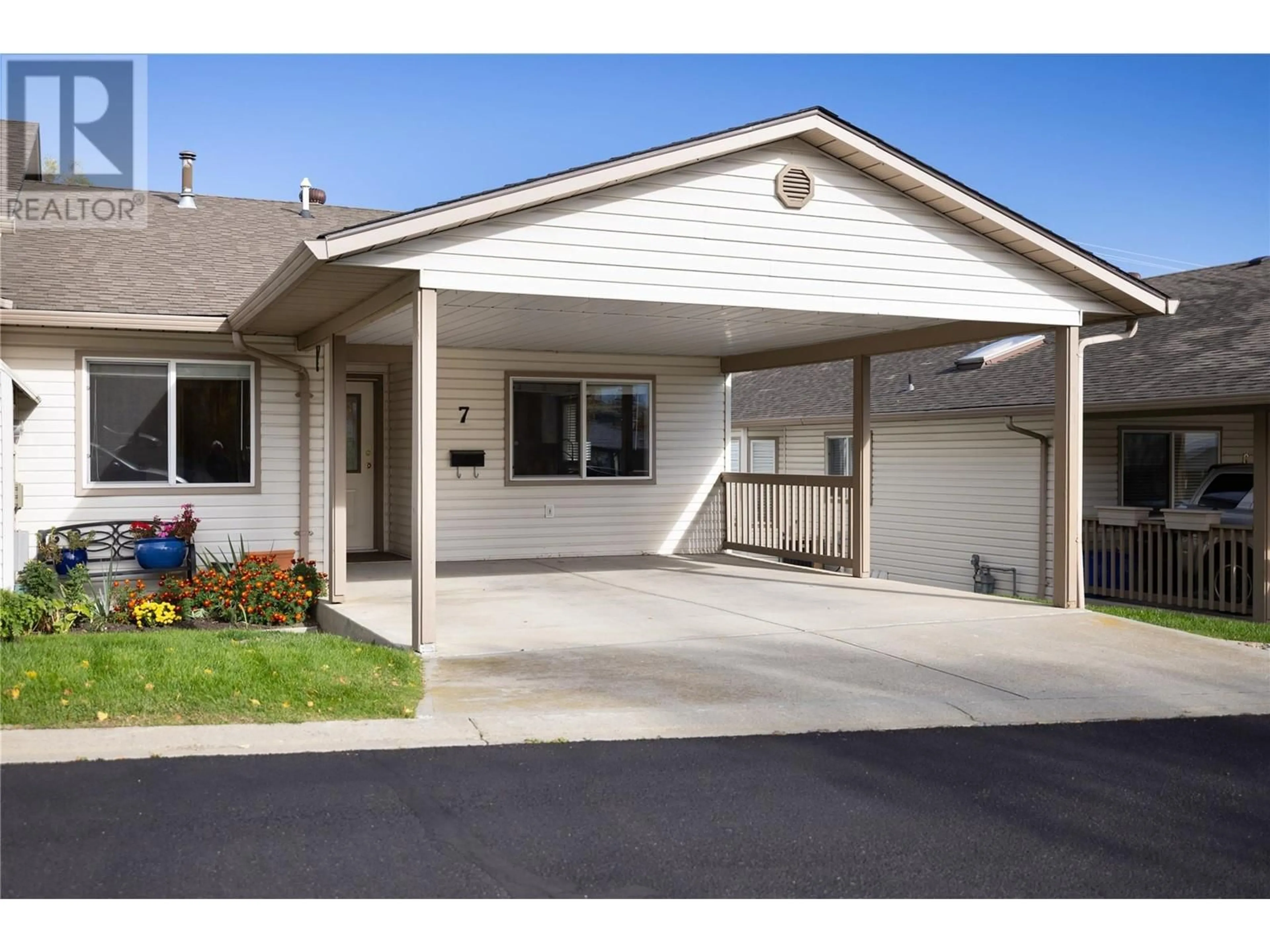 Home with vinyl exterior material, street for 7 - 4210 ALEXIS PARK DRIVE, Vernon British Columbia V1T6H3