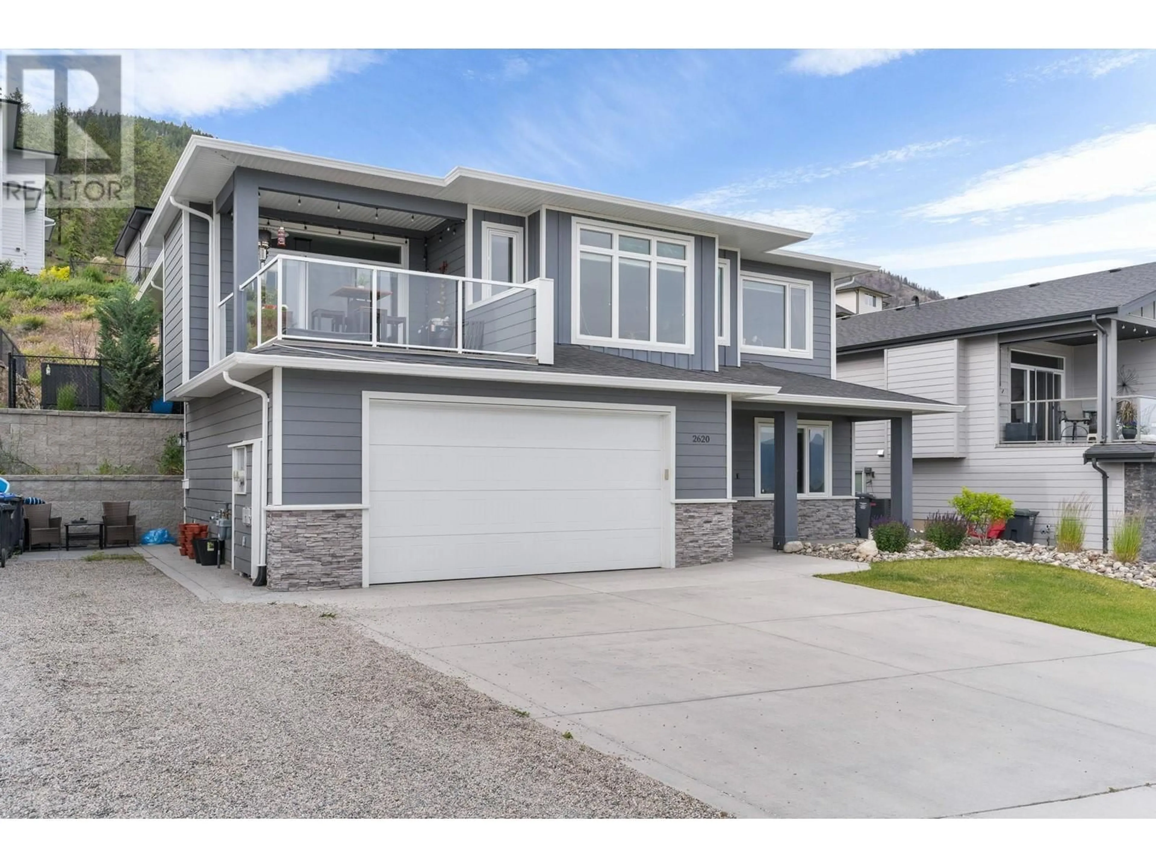 Frontside or backside of a home, the street view for 2620 Paramount Drive, West Kelowna British Columbia V4T3N3