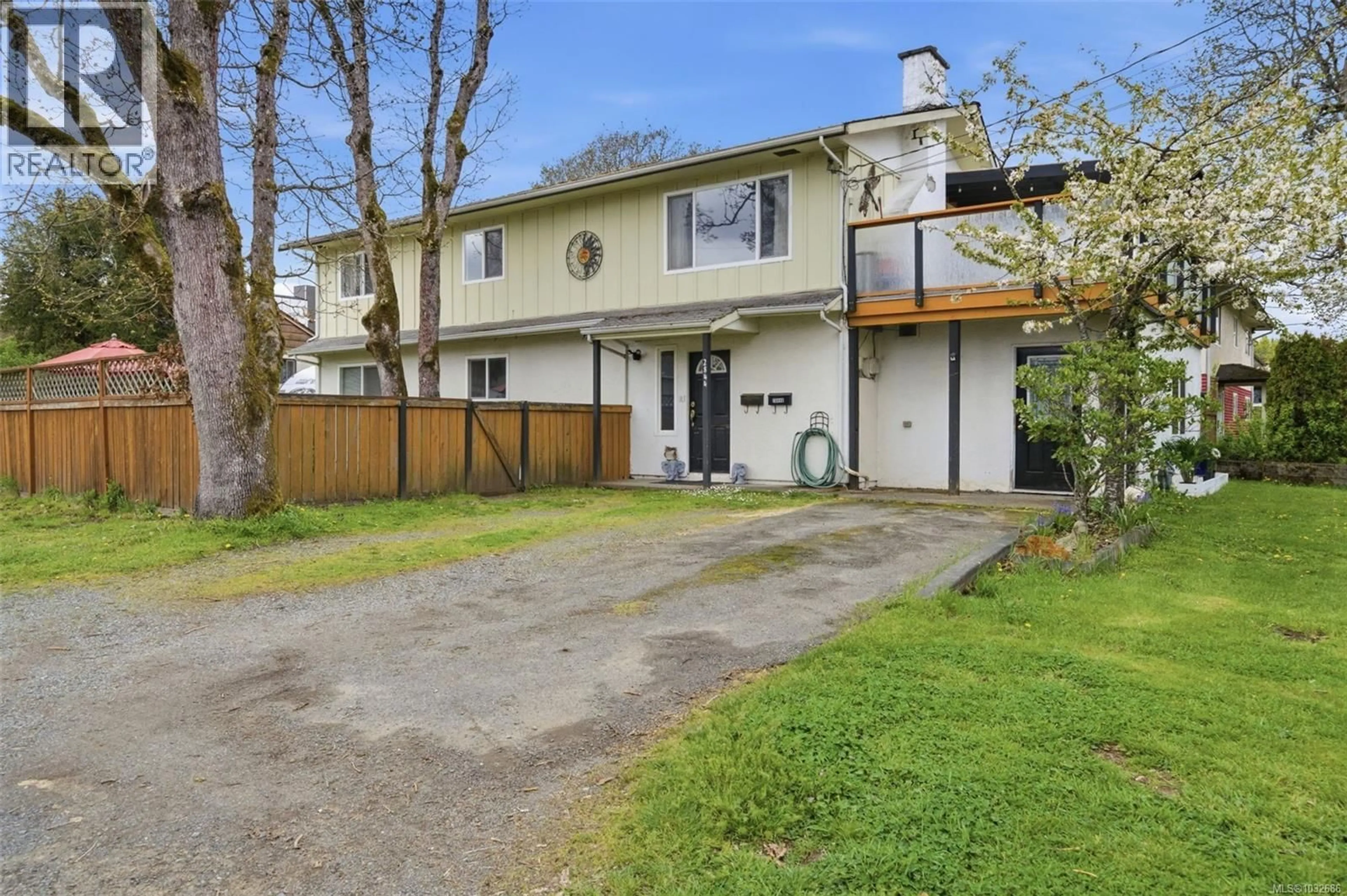 A pic from outside/outdoor area/front of a property/back of a property/a pic from drone, street for 2844 RITA ROAD, Langford British Columbia V9B4A1