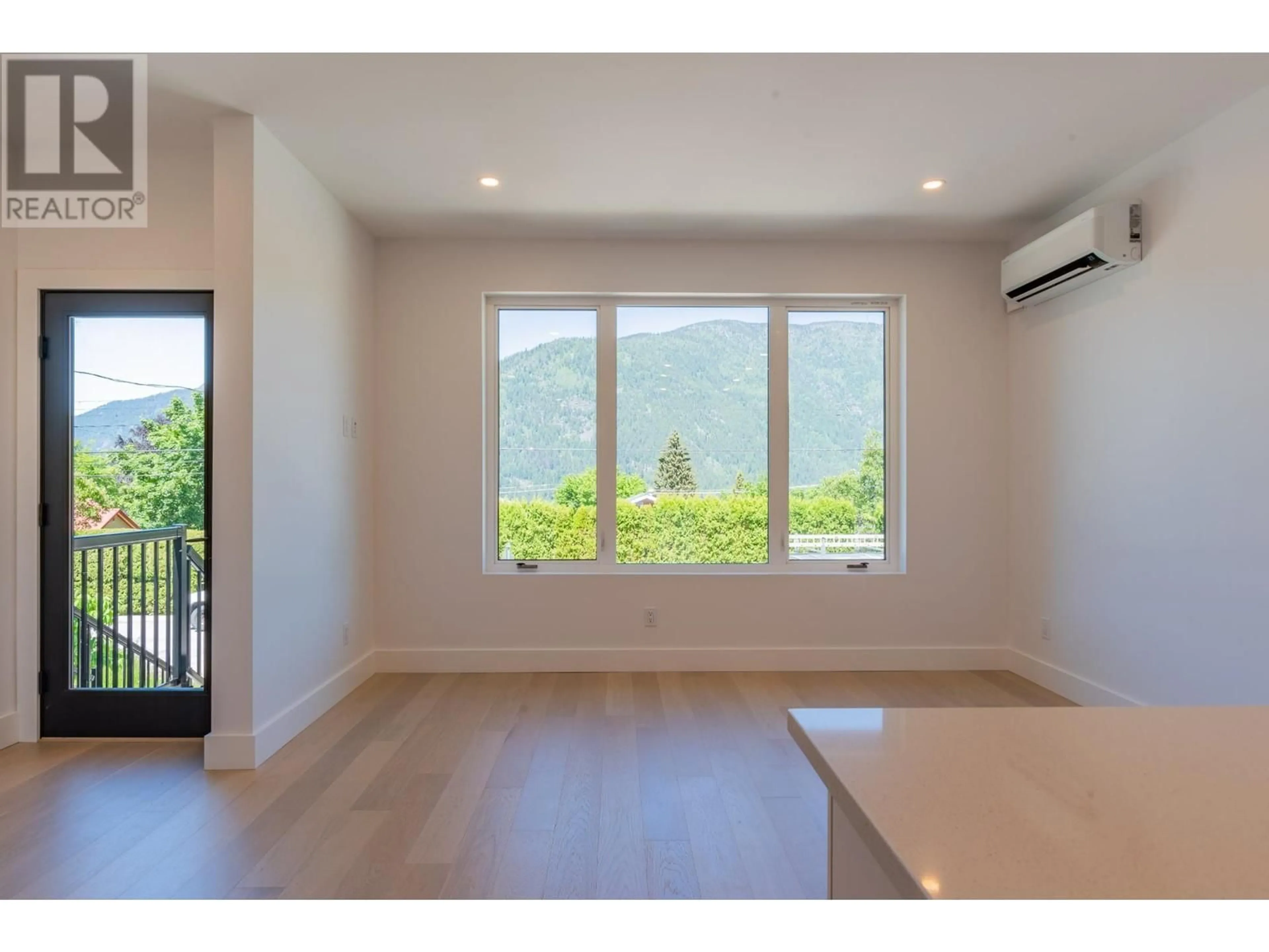 A pic of a room, wood floors for 516 Robson Street Unit# A, Nelson British Columbia V1L5A7