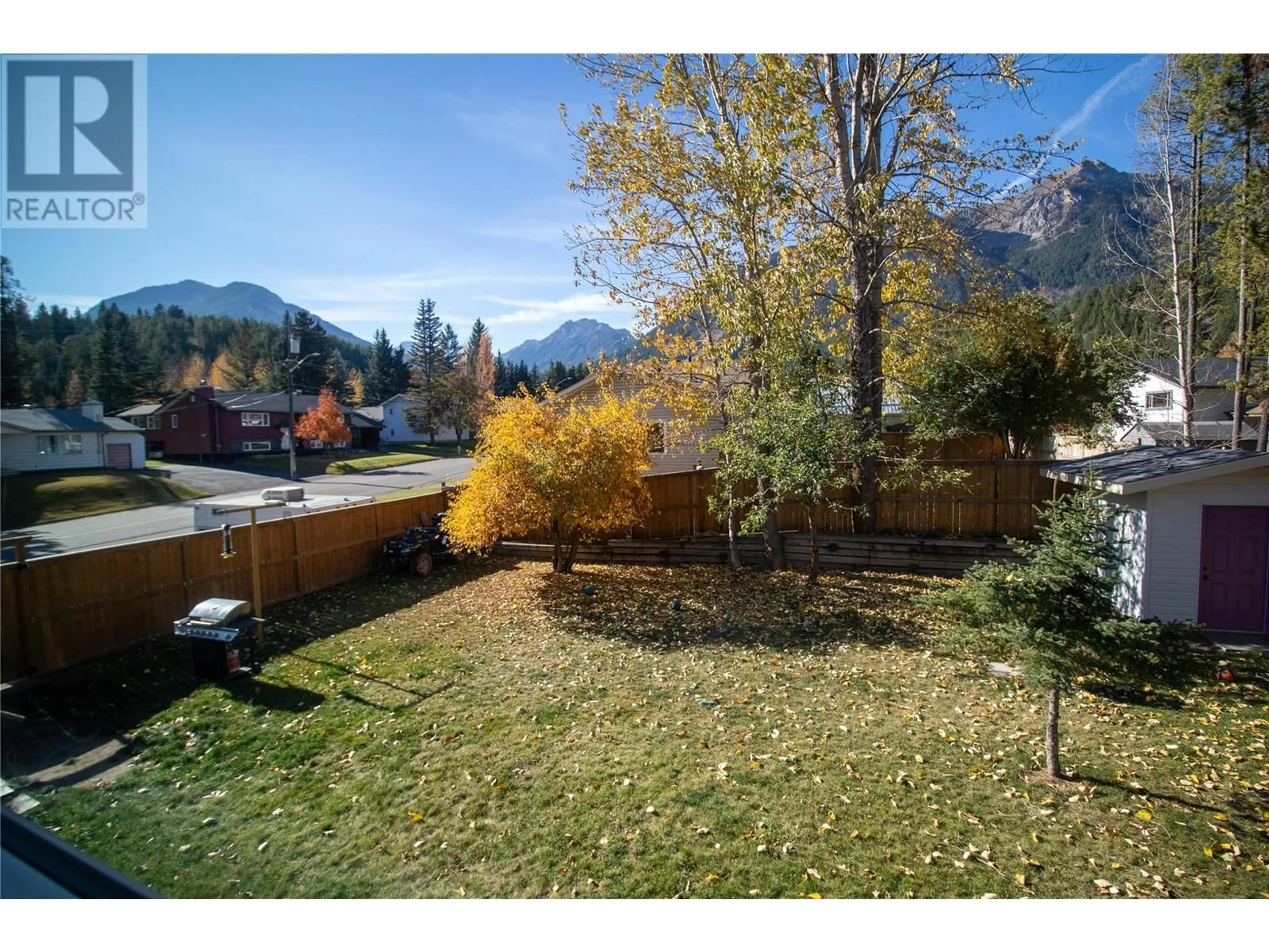 A pic from outside/outdoor area/front of a property/back of a property/a pic from drone, mountain view for 751 FORDING Drive, Elkford British Columbia V0B1H0