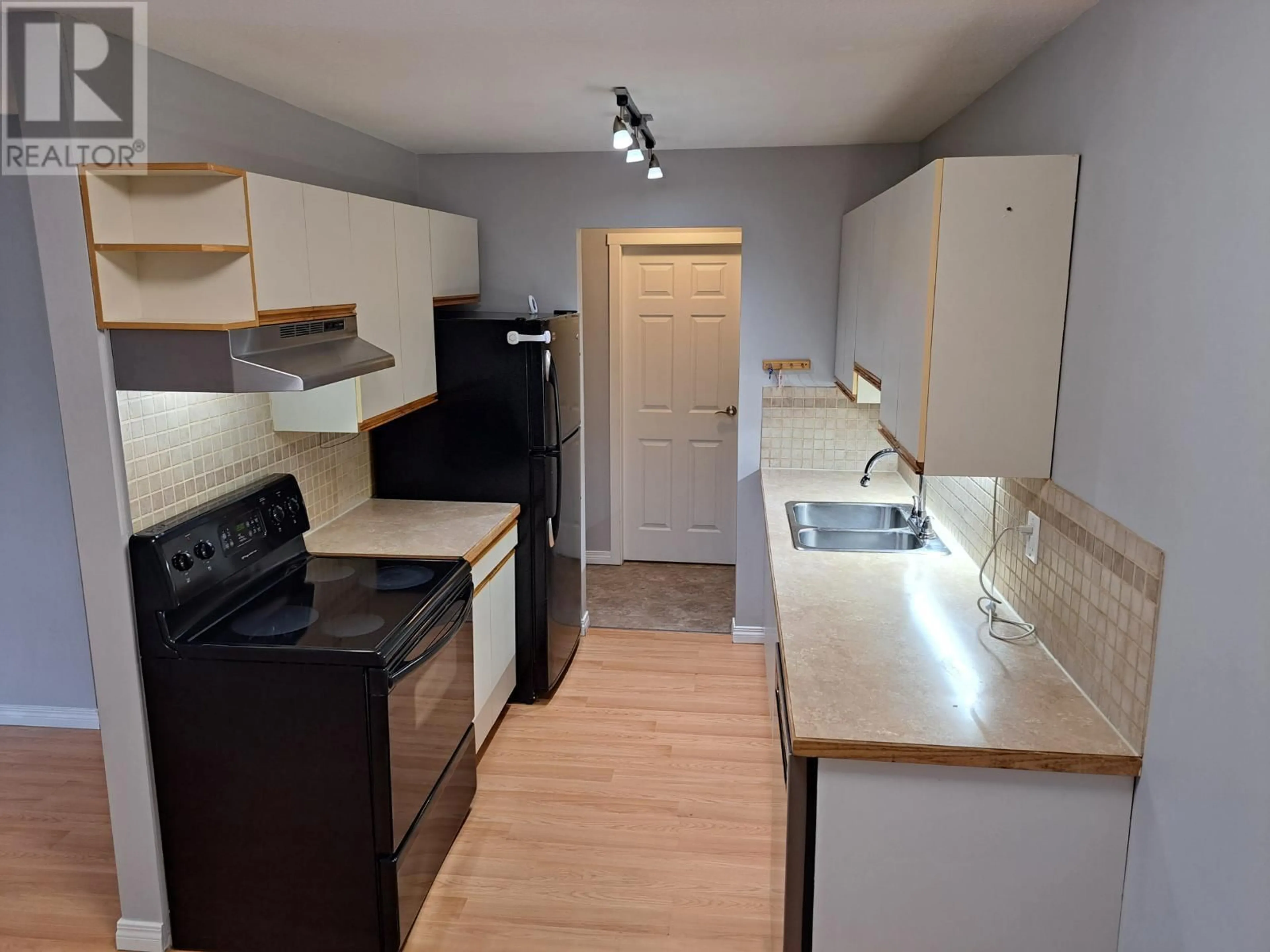 Standard kitchen, wood floors, cottage for 3800 28A Street Unit# 216, Vernon British Columbia V1T9K8