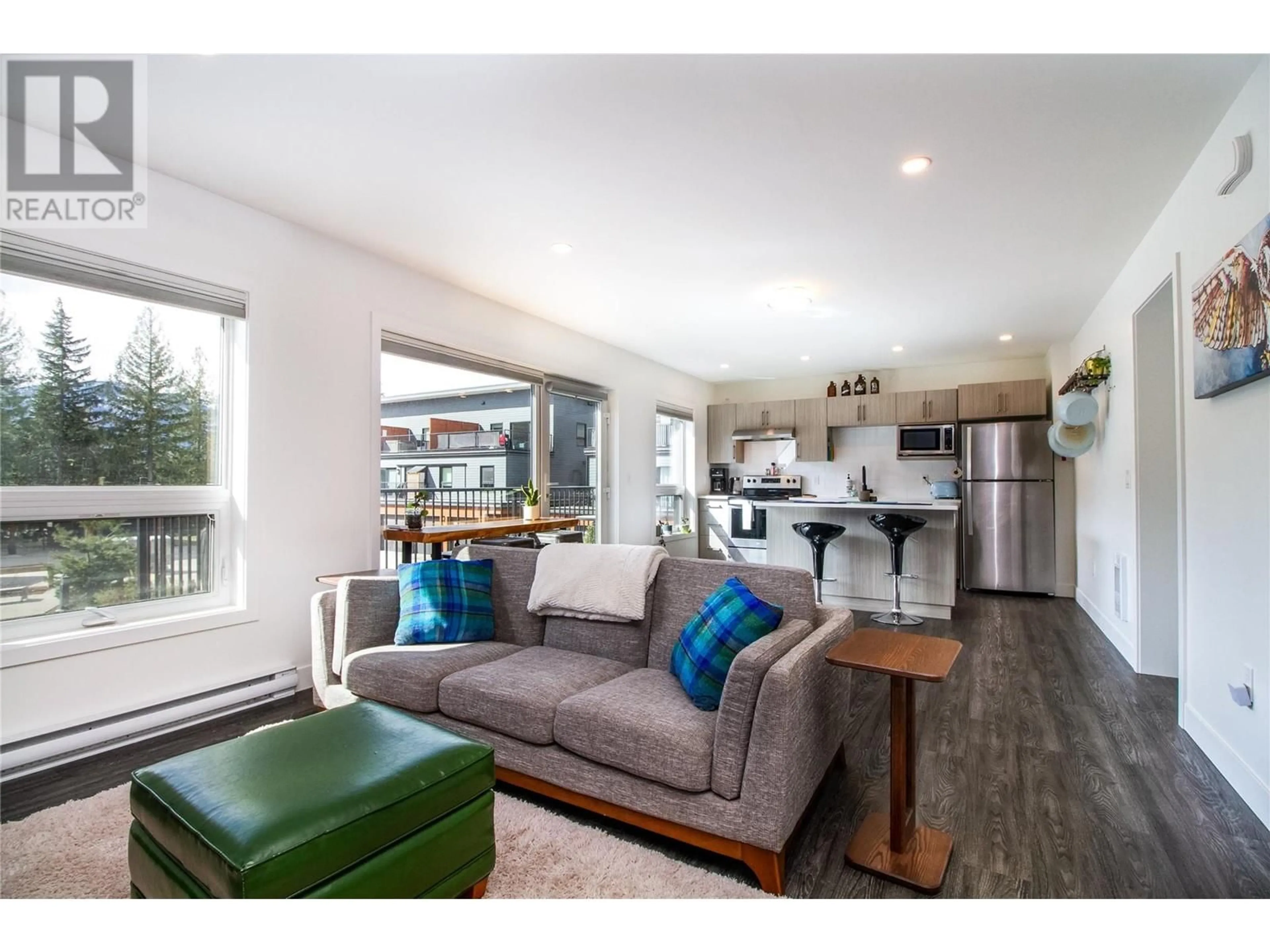 Open concept kitchen, wood/laminate floor for 7203 - 1901 NELS NELSON CRESCENT, Revelstoke British Columbia V0E2S3
