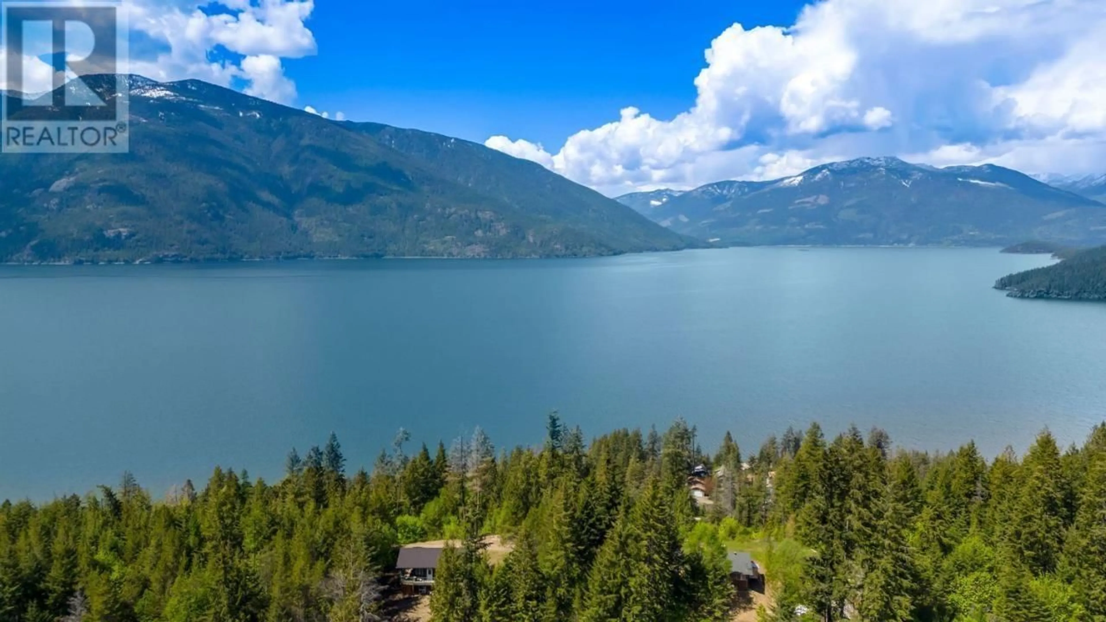 A pic from outside/outdoor area/front of a property/back of a property/a pic from drone, forest/trees view for 14504 - & 14506 HIGHWAY 3A OTHER, Gray Creek British Columbia V0B1S0