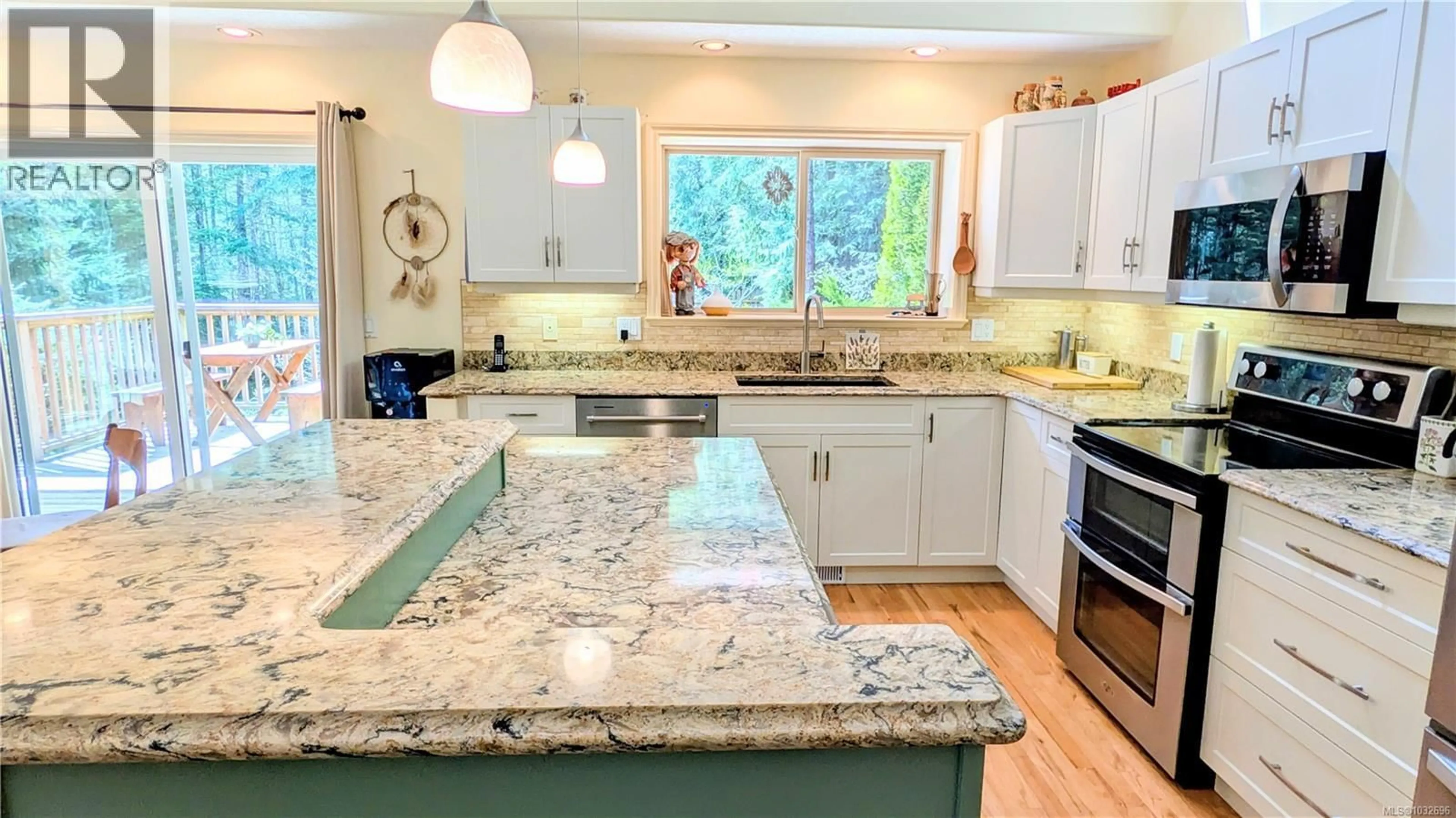 Open concept kitchen, ceramic/tile floor for 540 BERG ROAD, Gabriola Island British Columbia V0R1X2