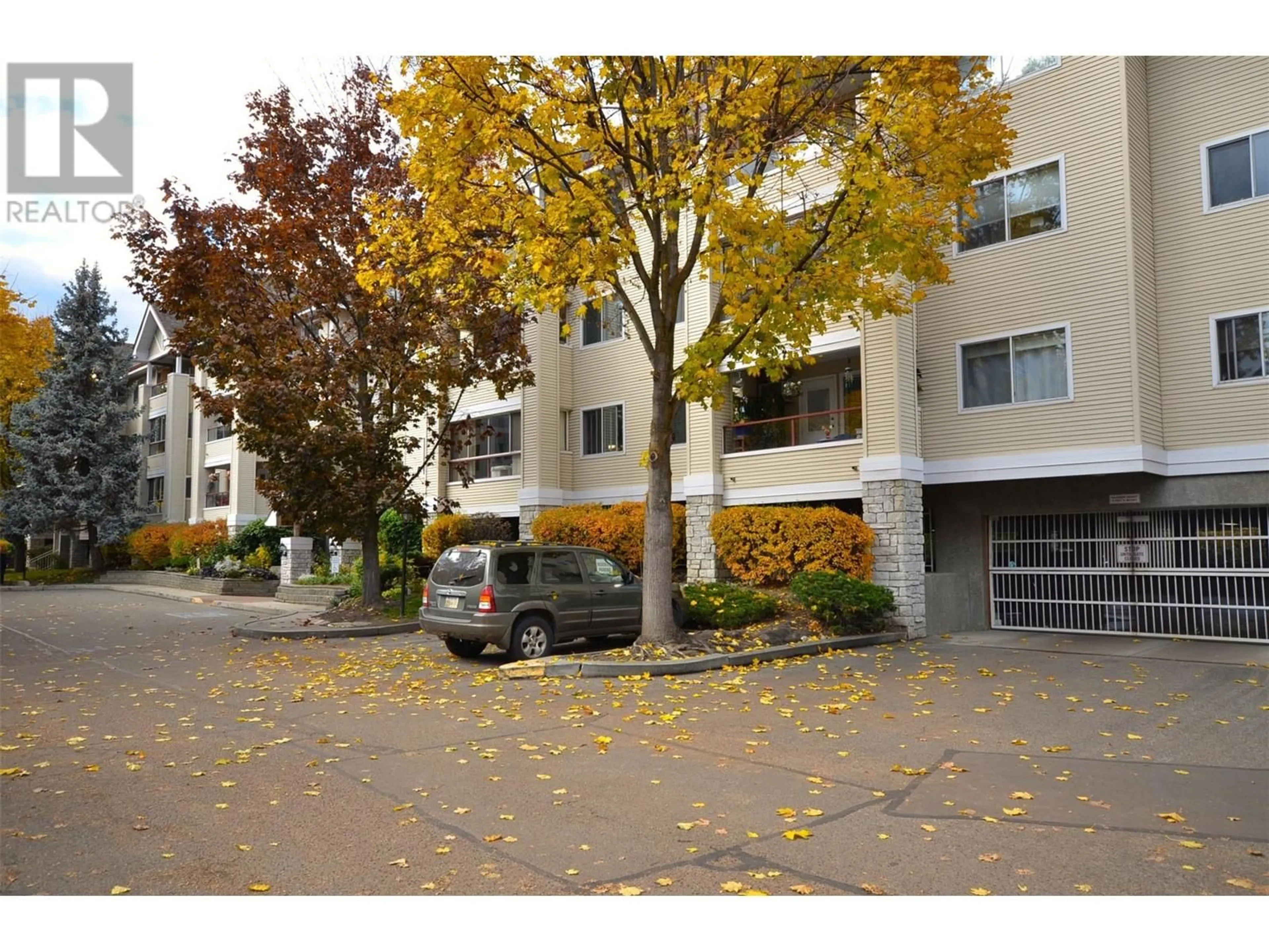 A pic from exterior of the house or condo, the street view for 940 Glenwood Avenue Unit# 104, Kelowna British Columbia V1Y9P2