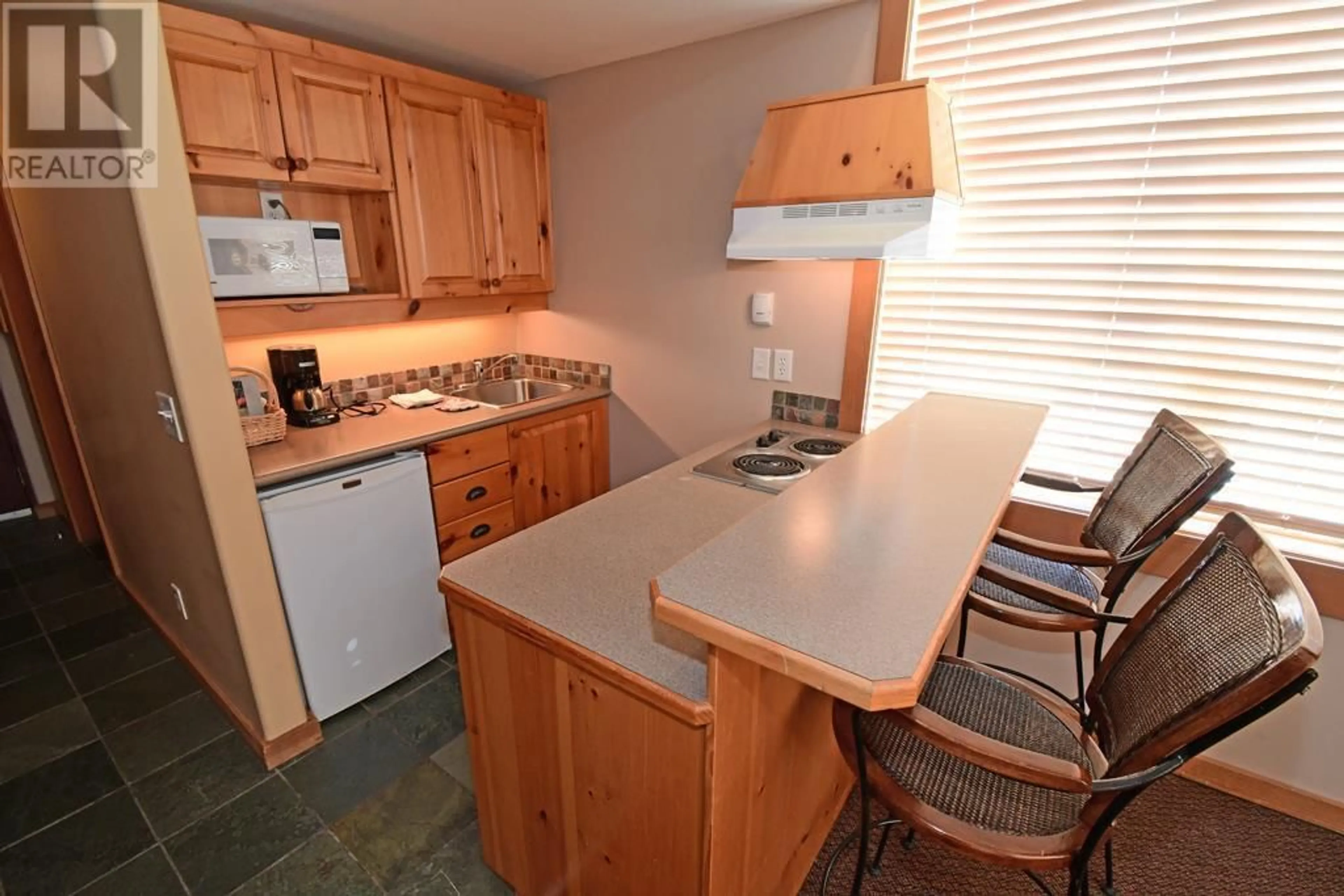 Standard kitchen, wood floors, cottage for 5335 Big White Road Unit# 224, Big White British Columbia V1P1P3