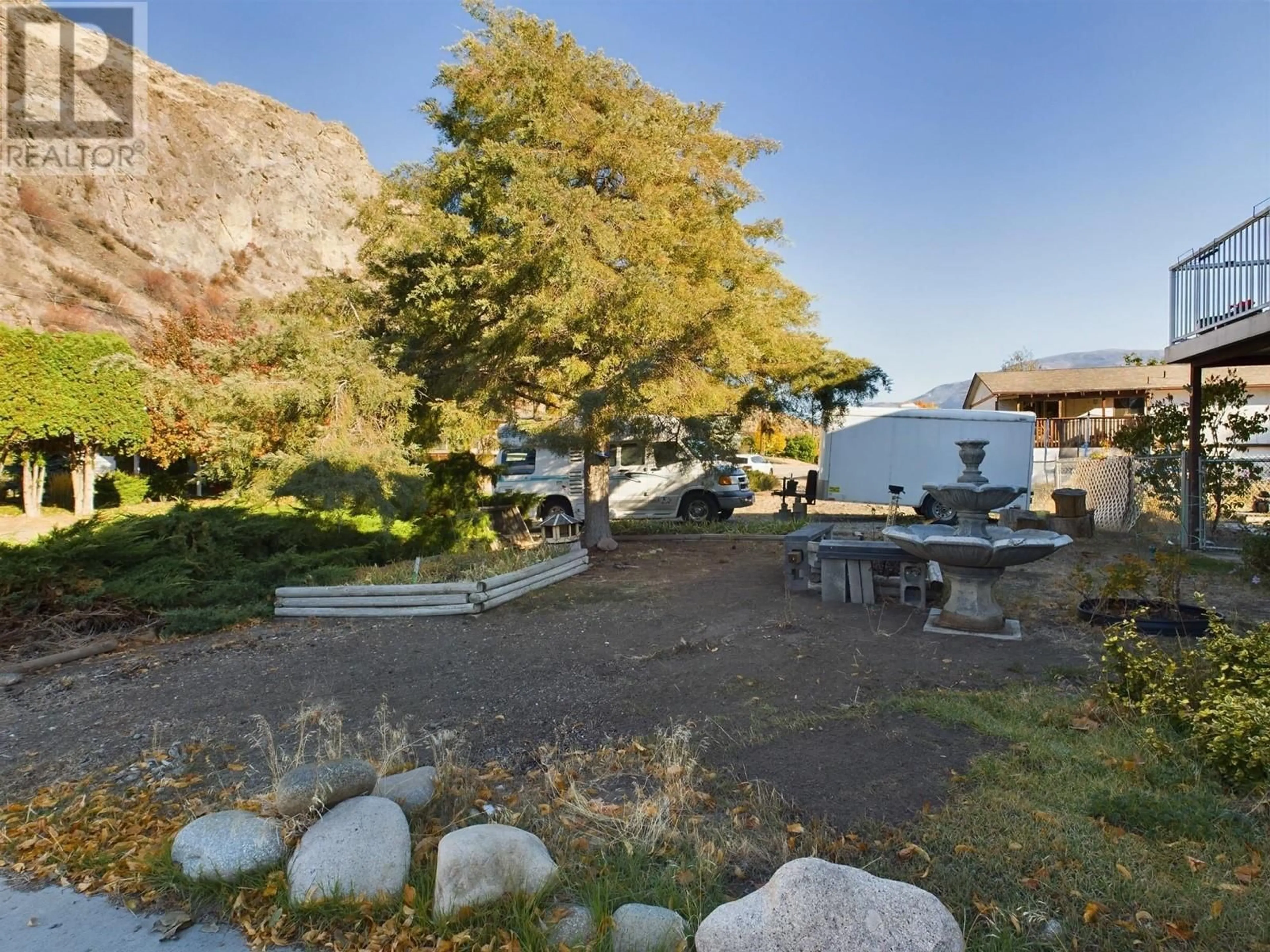 A pic from outside/outdoor area/front of a property/back of a property/a pic from drone, mountain view for 1013 MORNINGSTAR ROAD, Oliver British Columbia V0H1T6