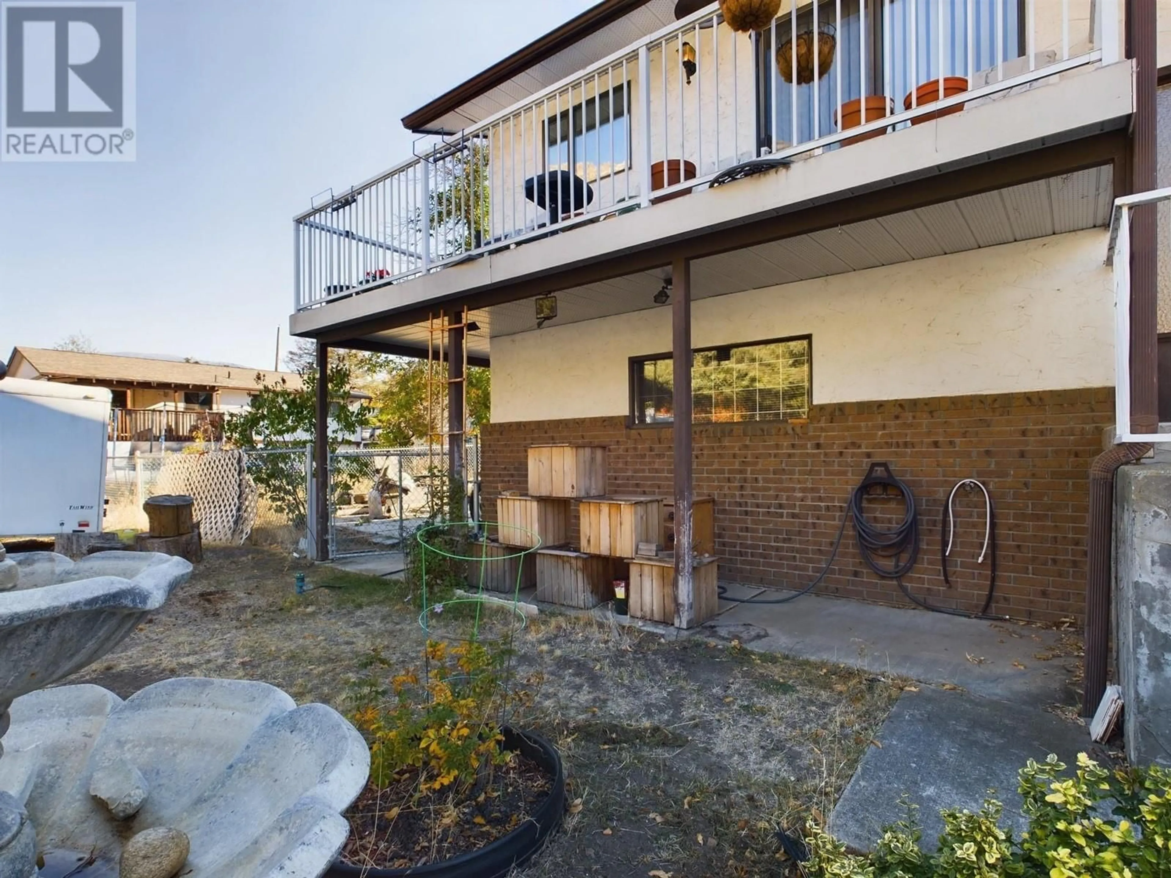 Patio, the fenced backyard for 1013 MORNINGSTAR Road, Oliver British Columbia V0H1T6