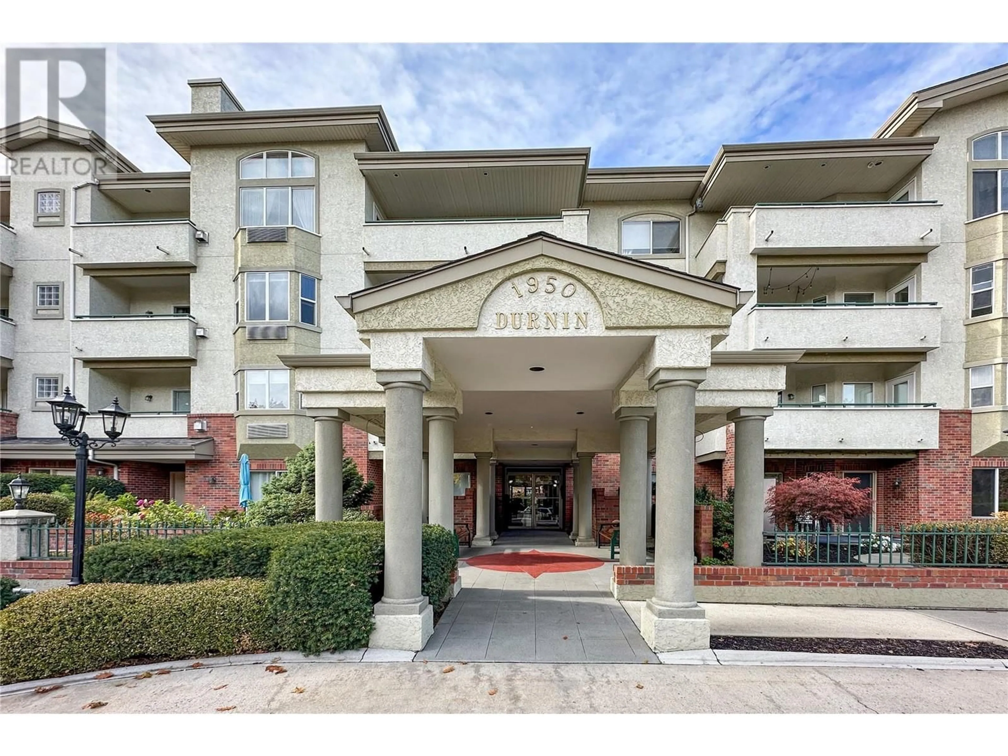 A pic from exterior of the house or condo, the front or back of building for 1950 Durnin Road Unit# 407, Kelowna British Columbia V1X7W6