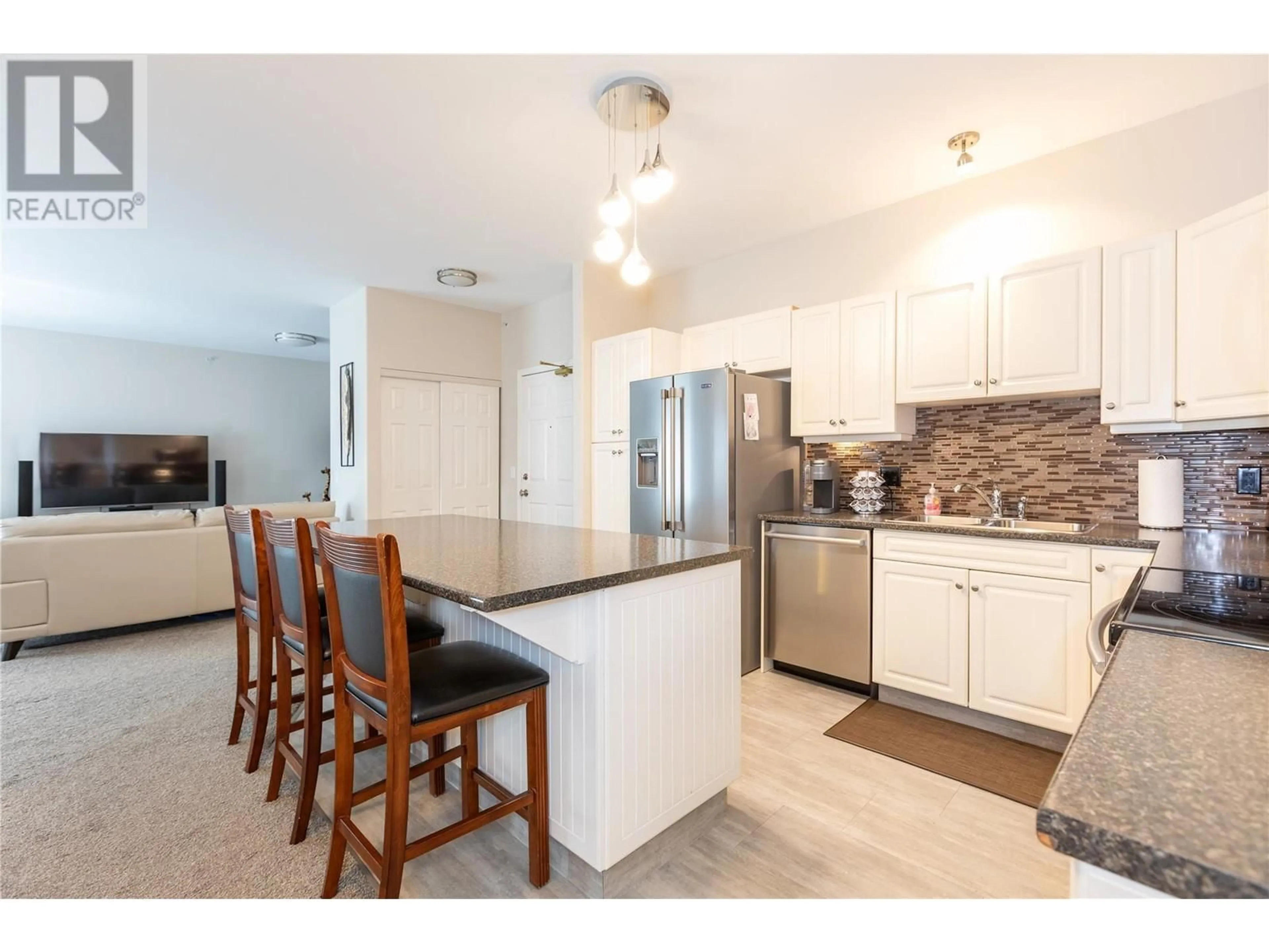 Open concept kitchen for 1950 Durnin Road Unit# 407, Kelowna British Columbia V1X7W6