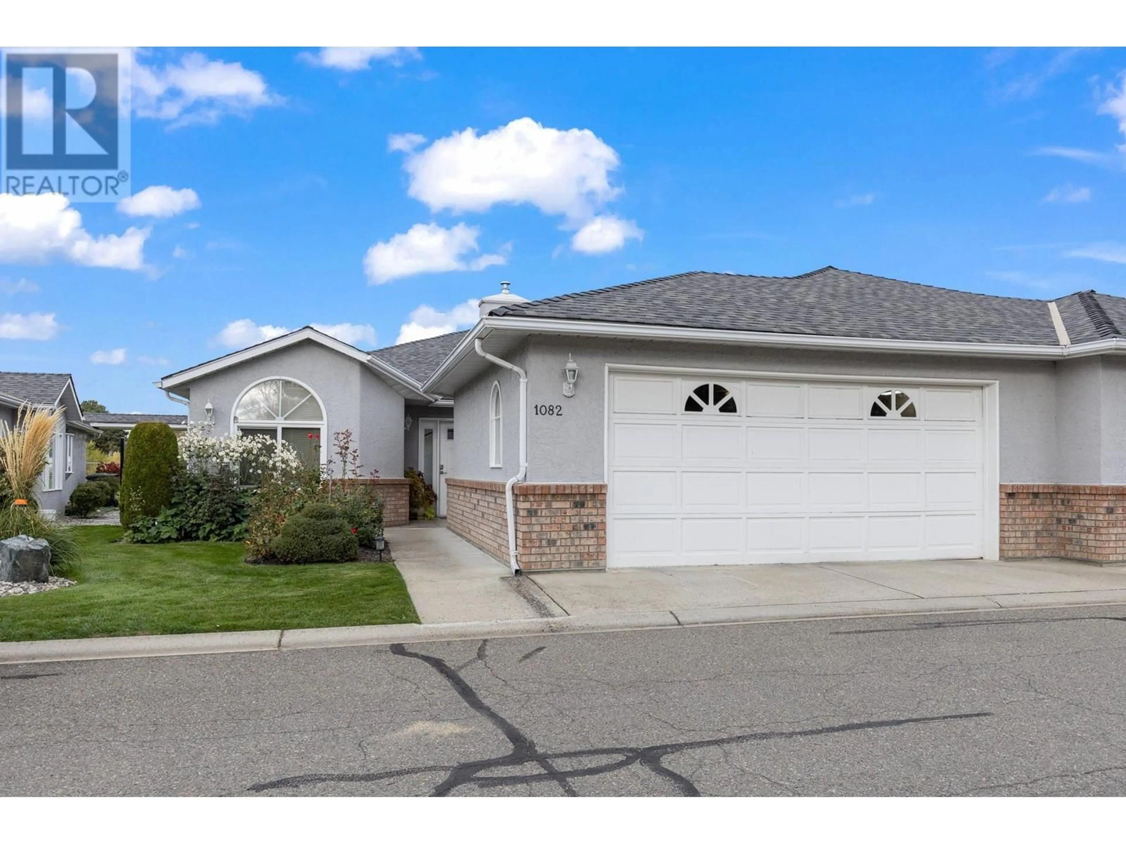 Frontside or backside of a home, the street view for 1082 Lanfranco Road, Kelowna British Columbia V1W3W5