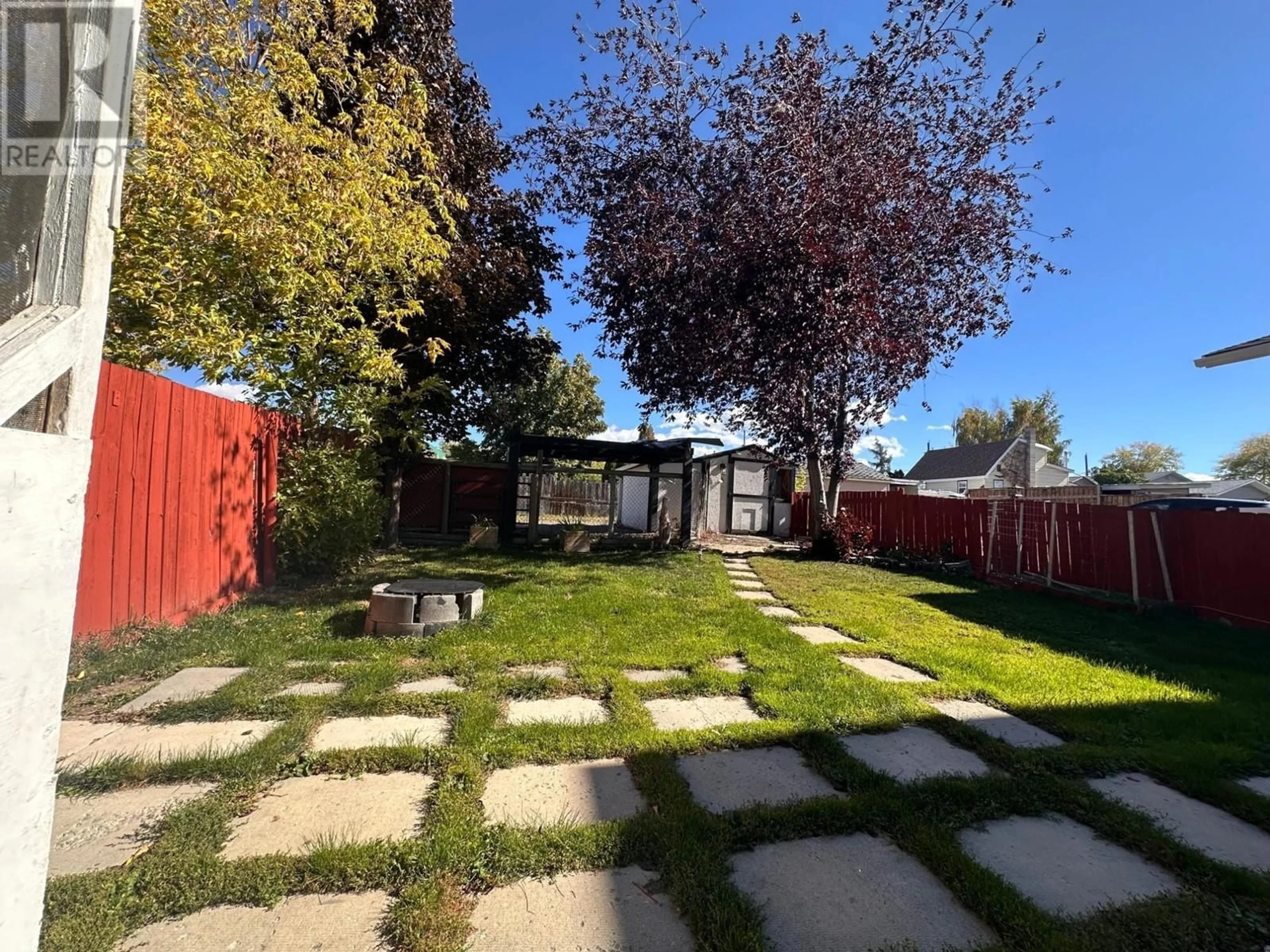 Patio, the fenced backyard for 306 5TH AVENUE S Avenue, Cranbrook British Columbia V1C2G6