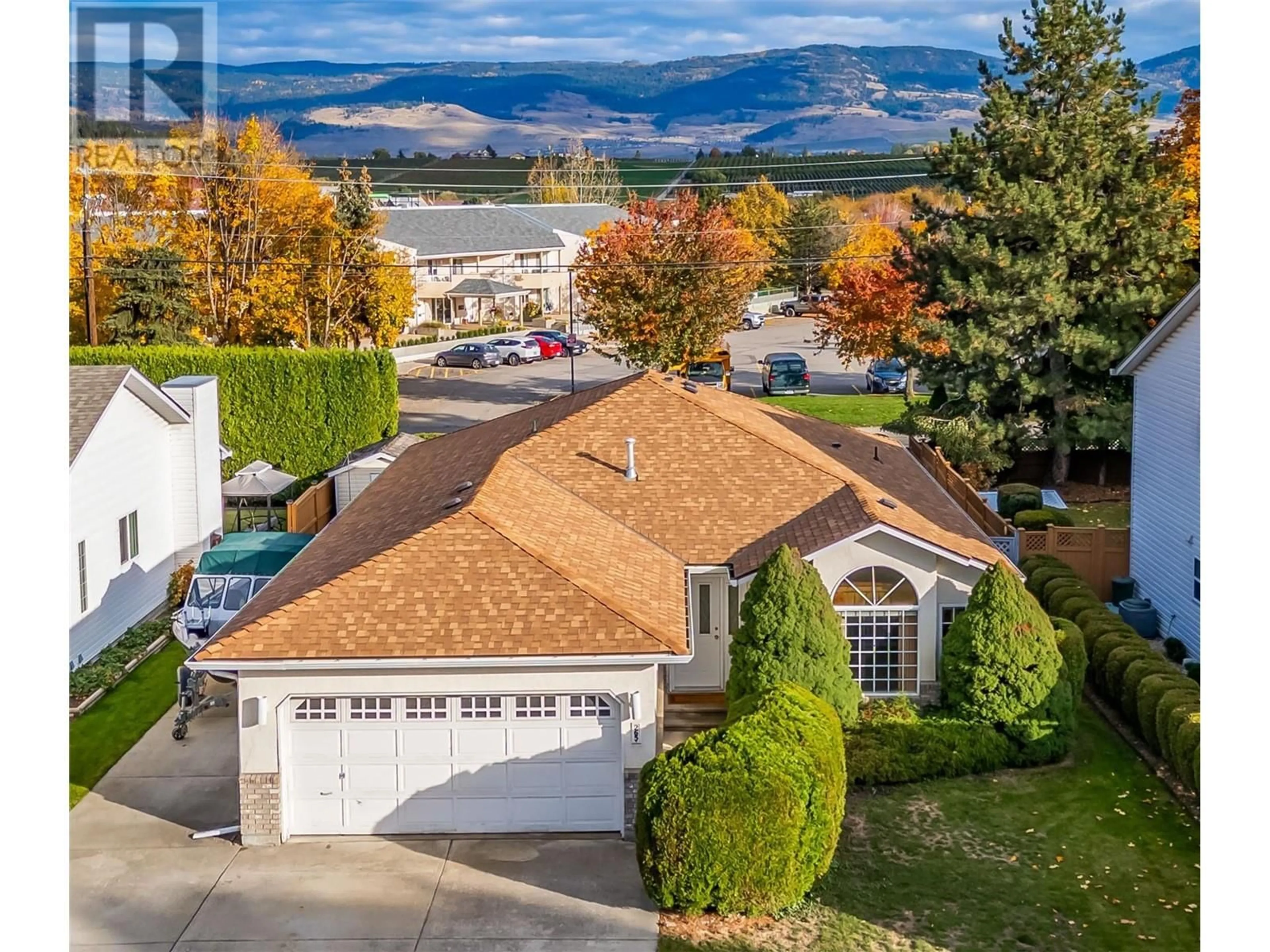 Frontside or backside of a home, the street view for 265 Ranchland Road, Kelowna British Columbia V1V1T3