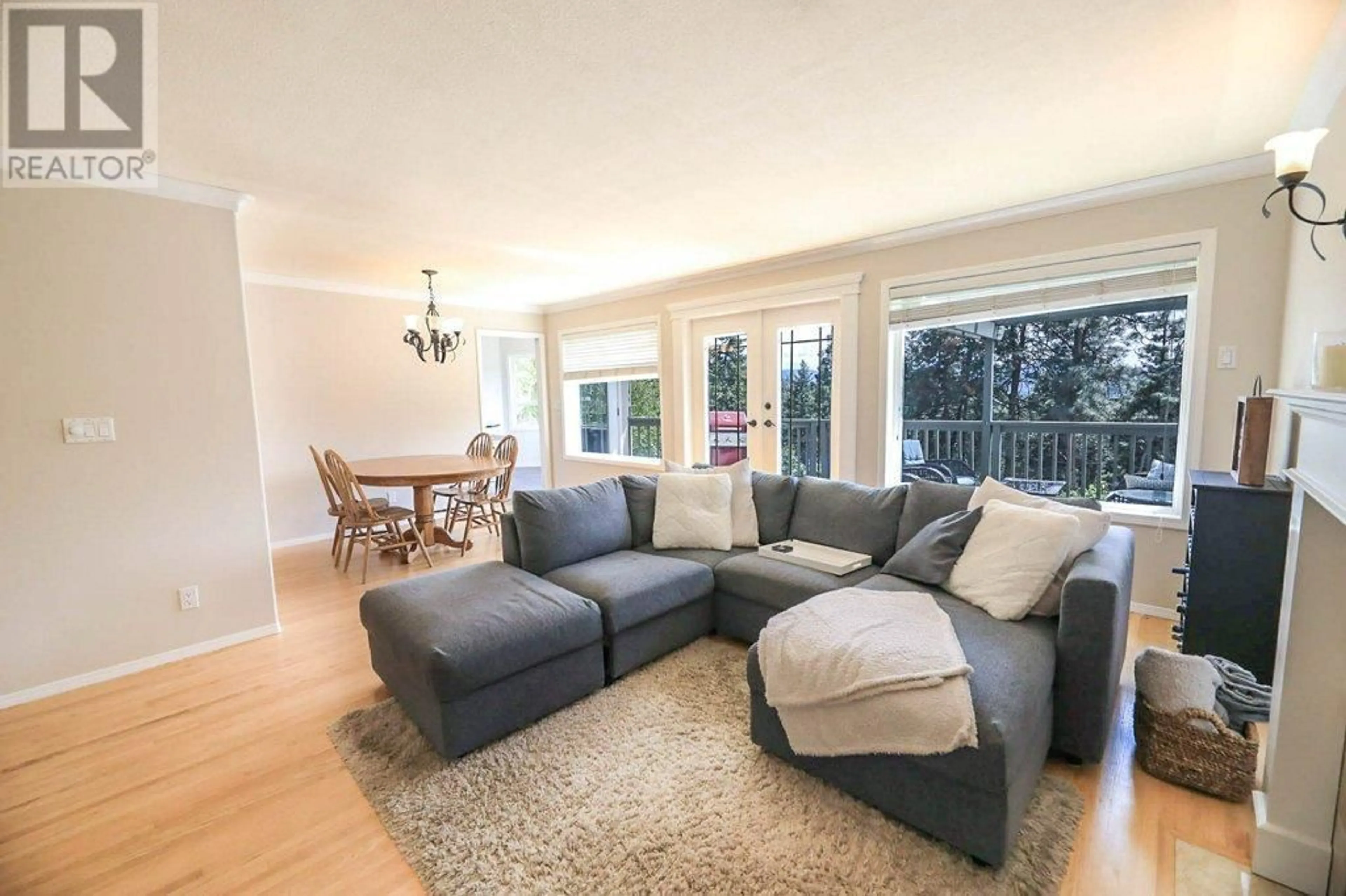 Living room, wood floors for 14487 SUTHERLAND Place, Summerland British Columbia V0H1Z8