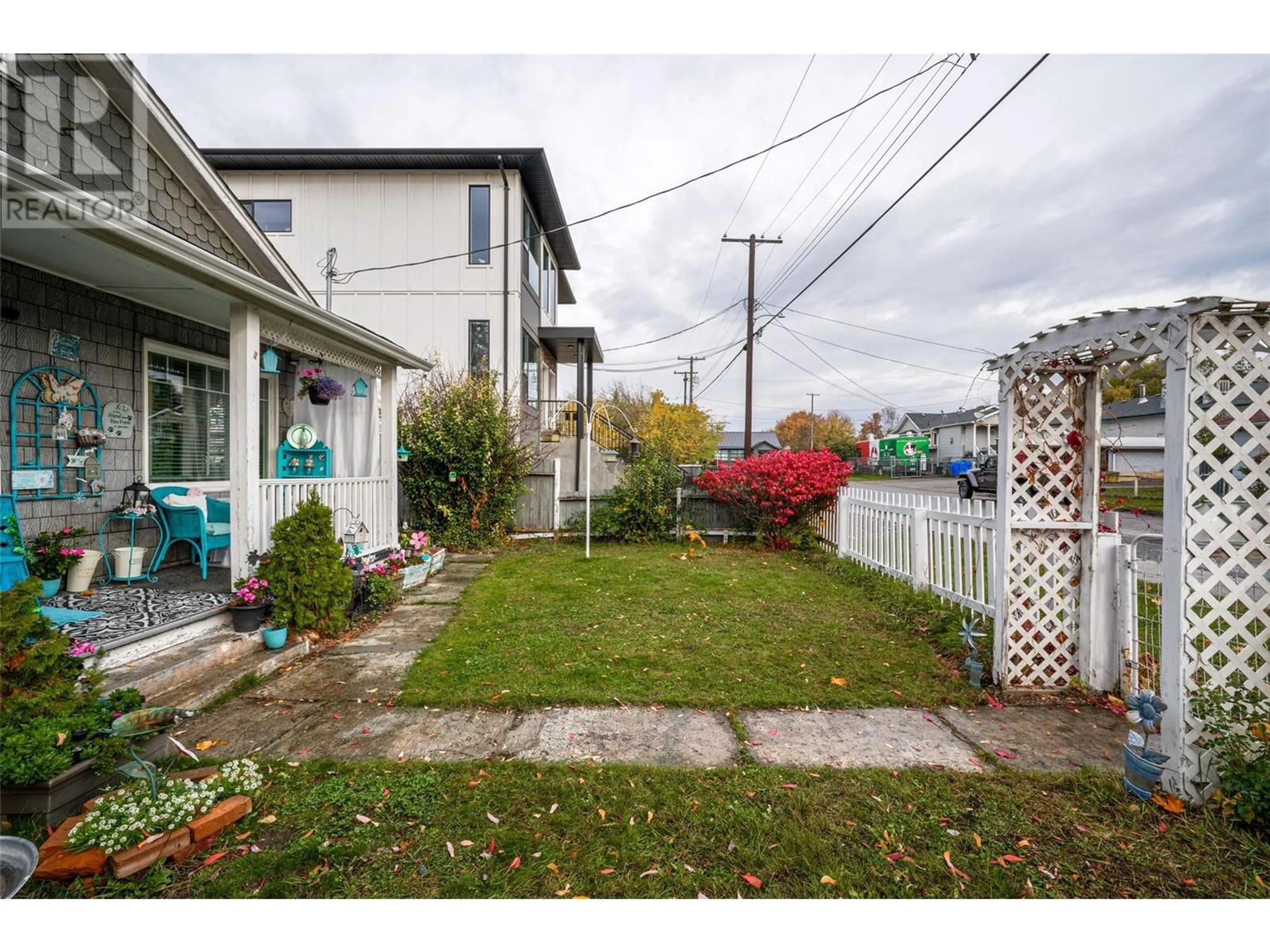 Frontside or backside of a home, the fenced backyard for 4008 31 Street, Vernon British Columbia V1T5J6