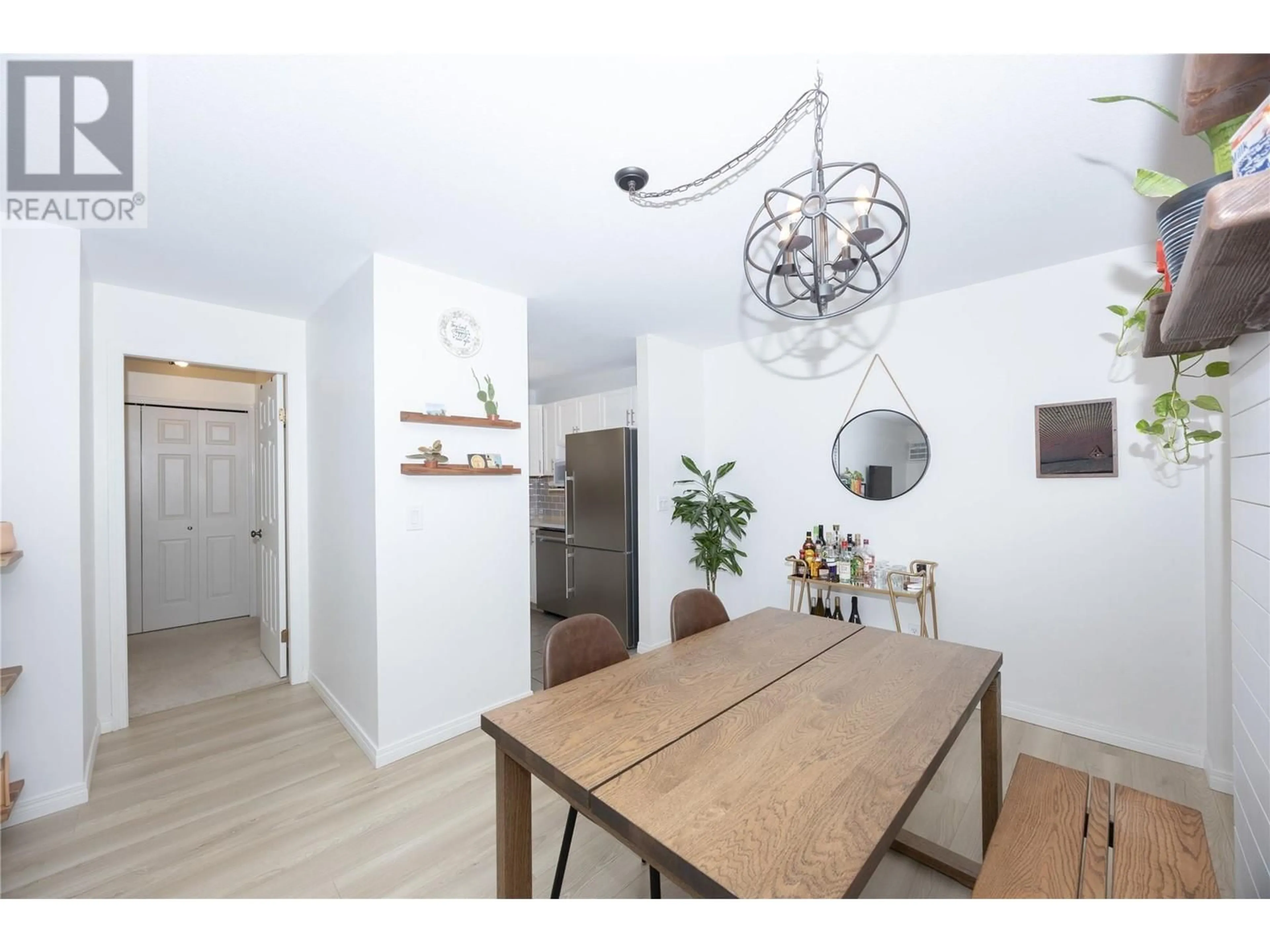 Dining room, wood floors, cottage for 3155 De Montreuil Court Unit# 301, Kelowna British Columbia V1W3W1