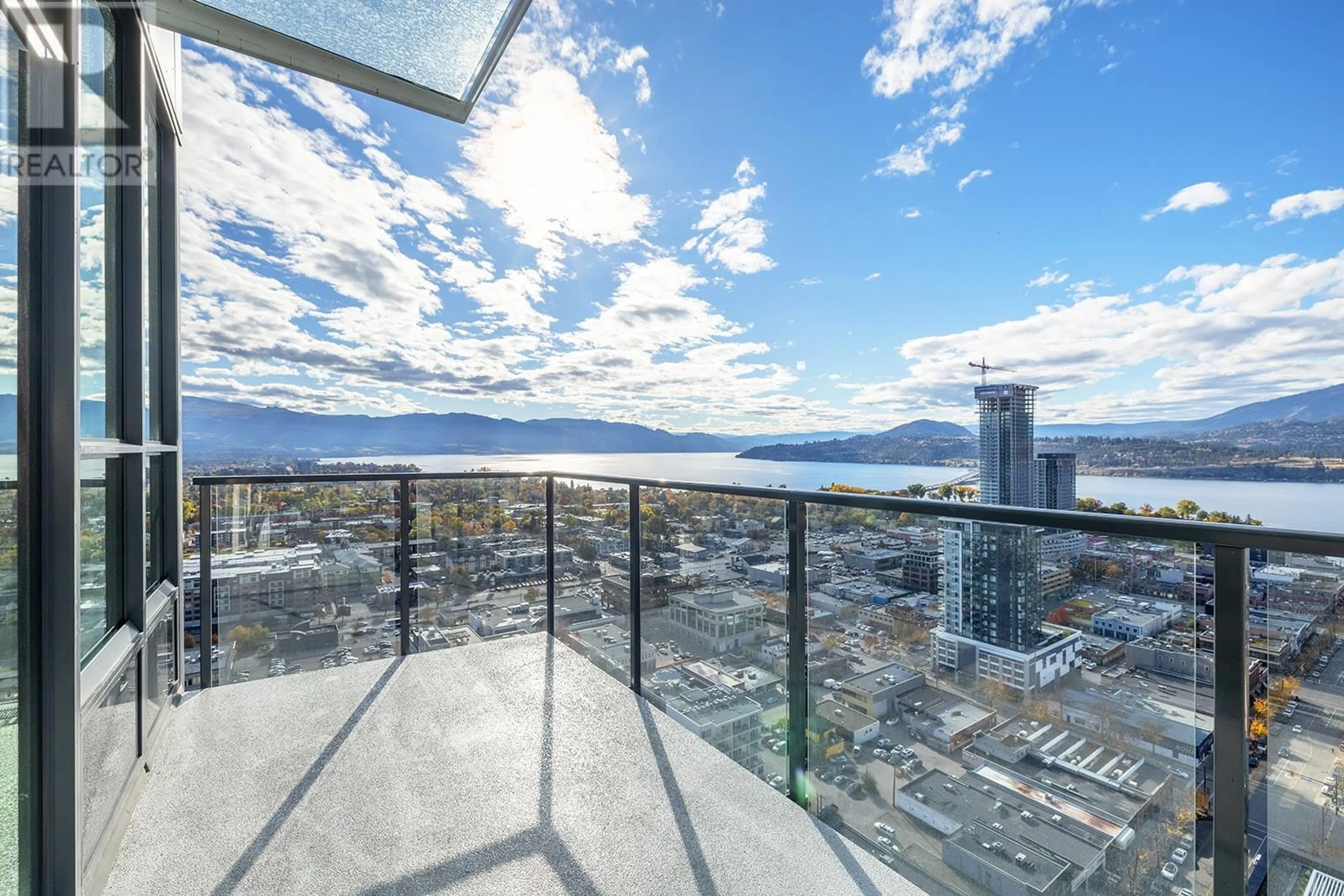 A pic from exterior of the house or condo, the view of city buildings for 1488 Bertram Street Unit# 3002, Kelowna British Columbia V1Y6P2