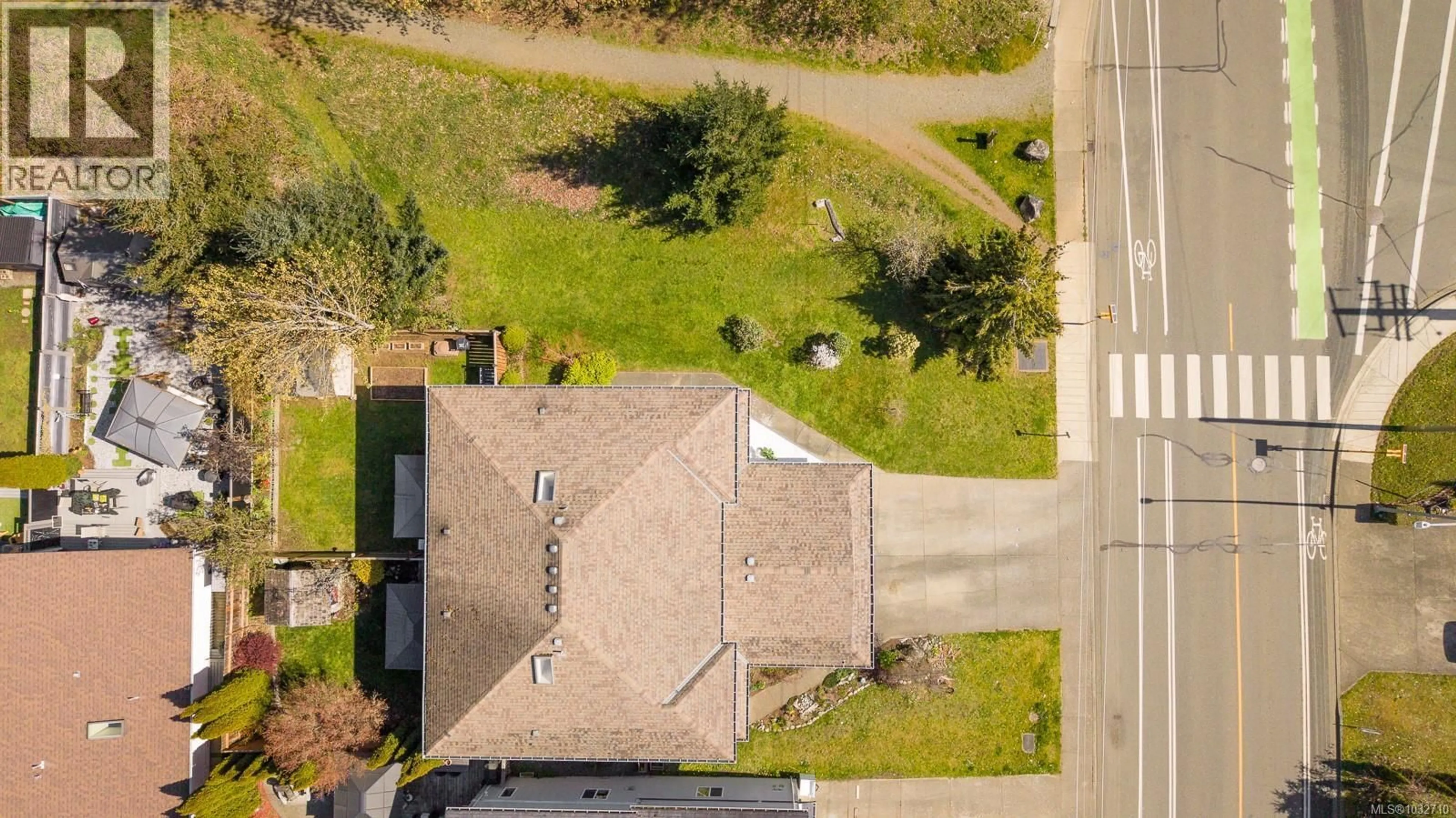 A pic from outside/outdoor area/front of a property/back of a property/a pic from drone, street for B - 2425 1ST STREET, Courtenay British Columbia V9N8X9