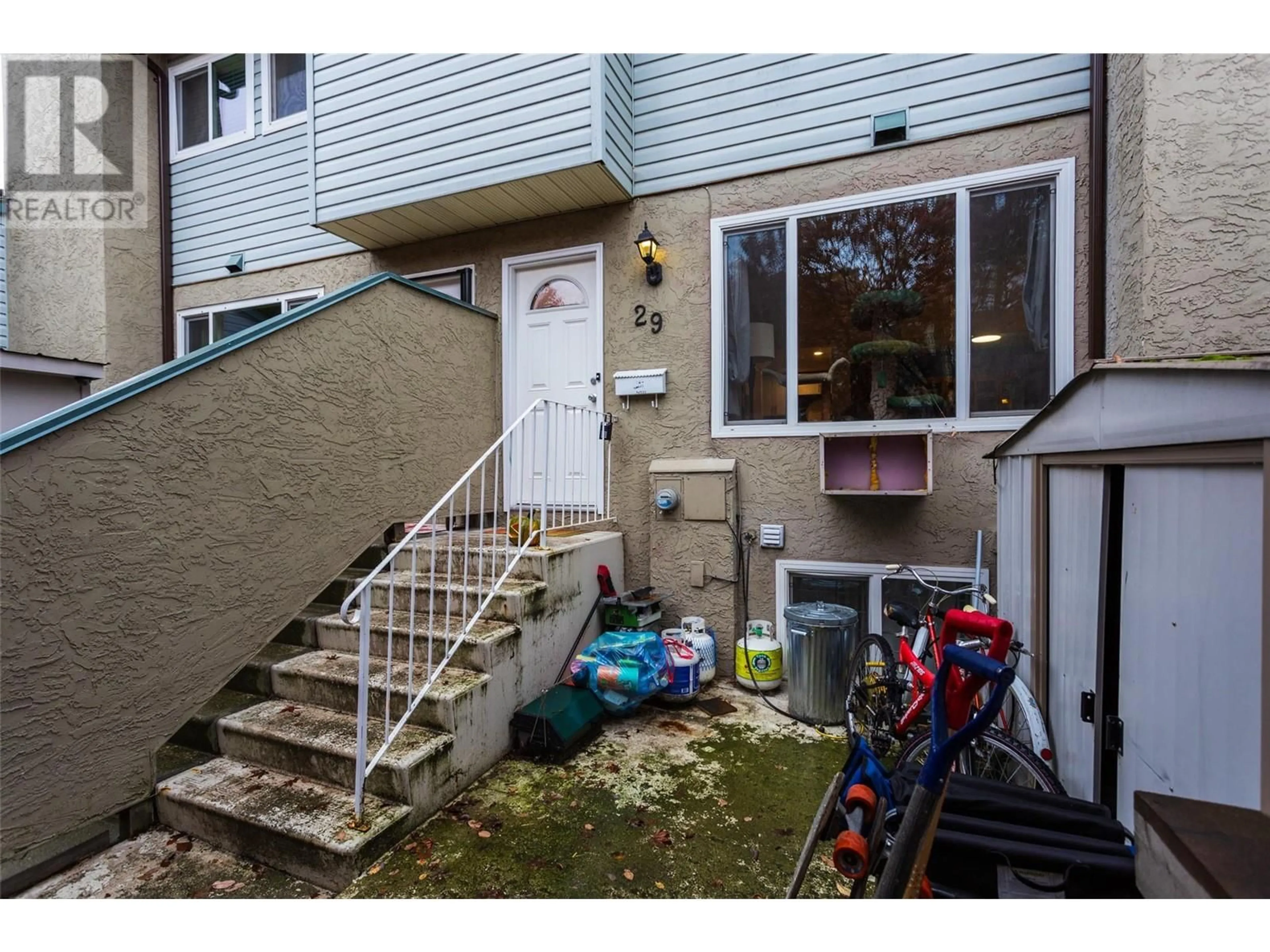 A pic from exterior of the house or condo, the street view for 1471 INKAR Road Unit# 29, Kelowna British Columbia V1Y8J1