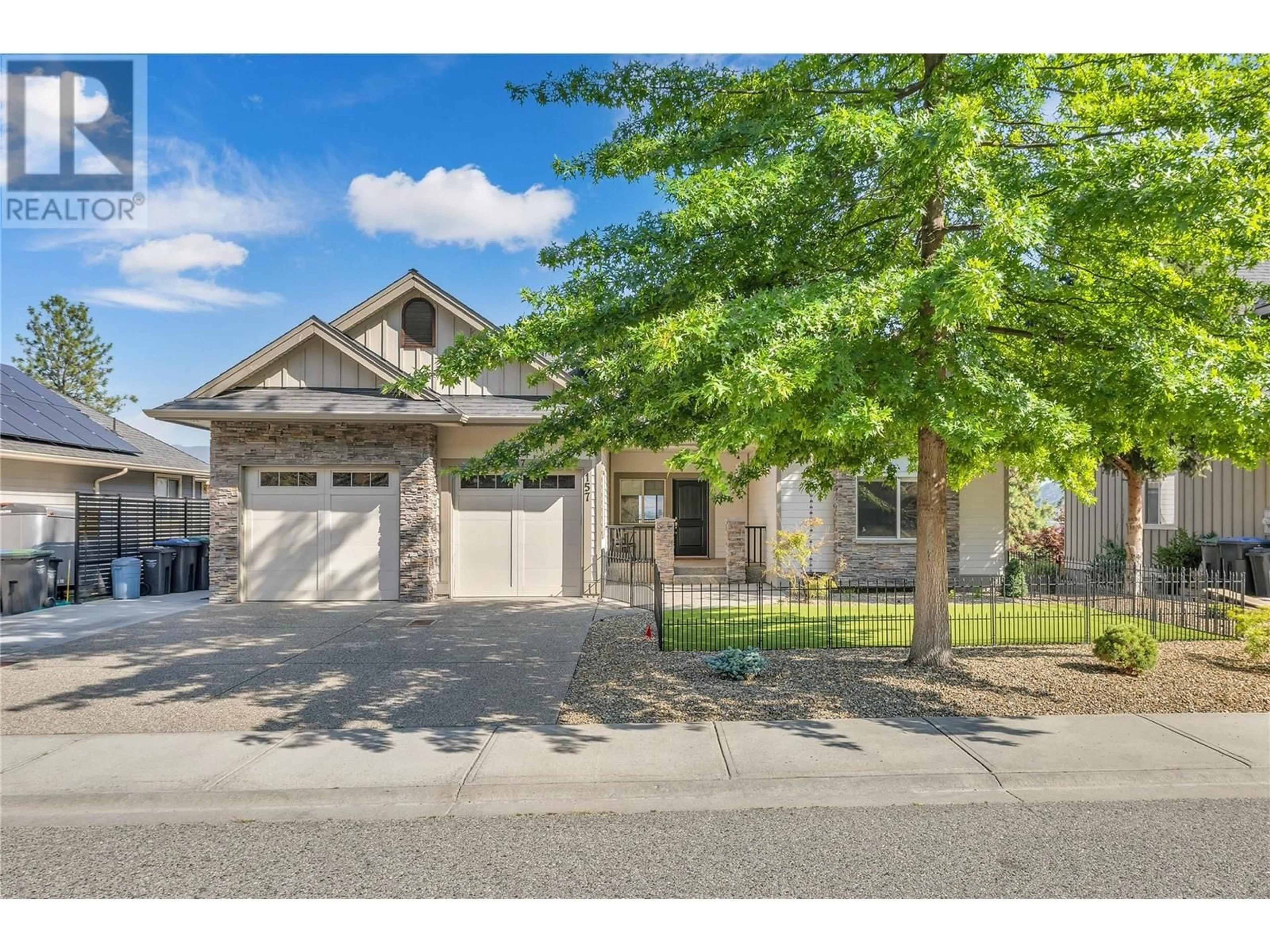 Frontside or backside of a home, the street view for 157 Terrace Hill Place, Kelowna British Columbia V1V2T2