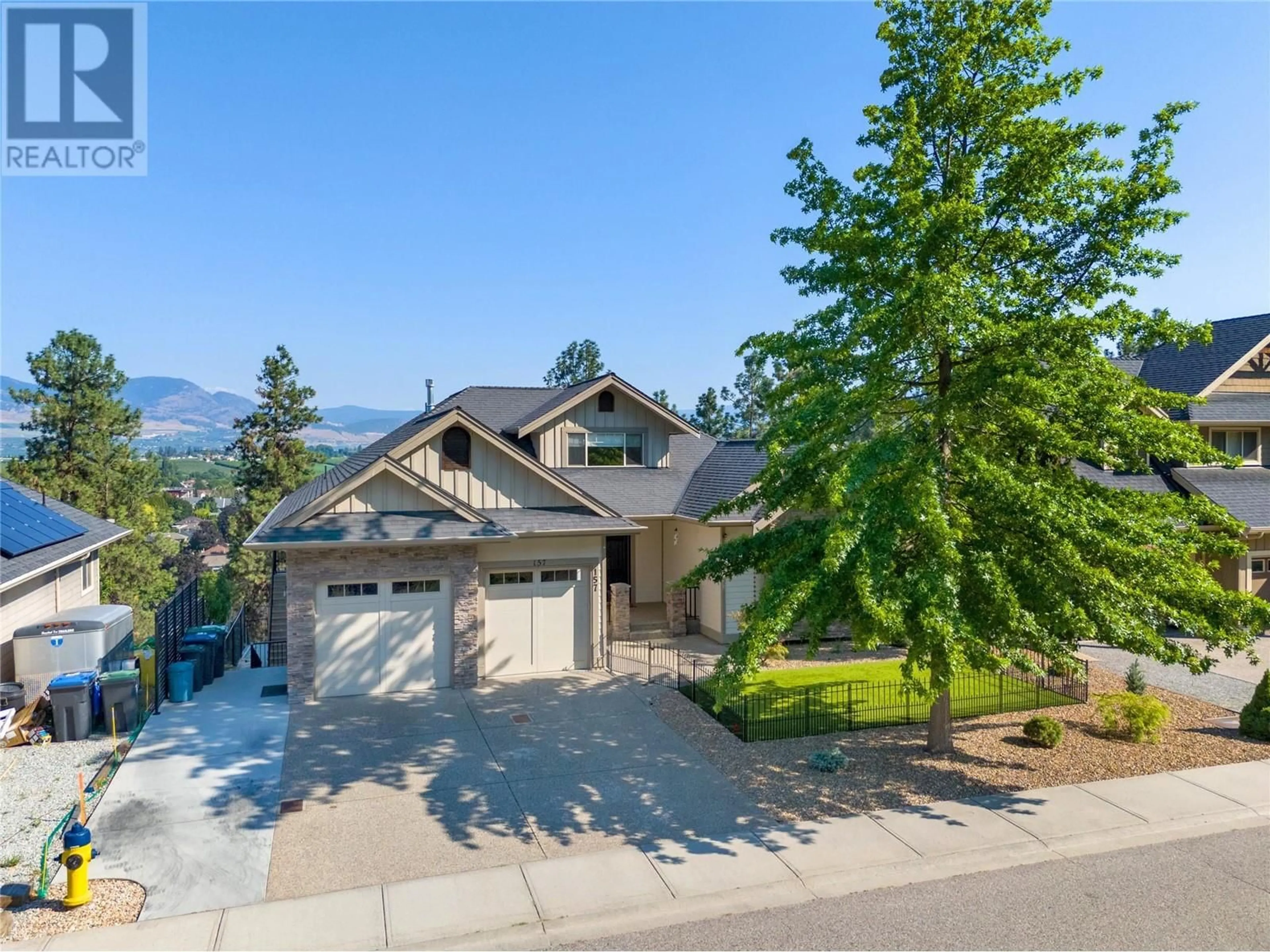 Frontside or backside of a home, the street view for 157 Terrace Hill Place, Kelowna British Columbia V1V2T2