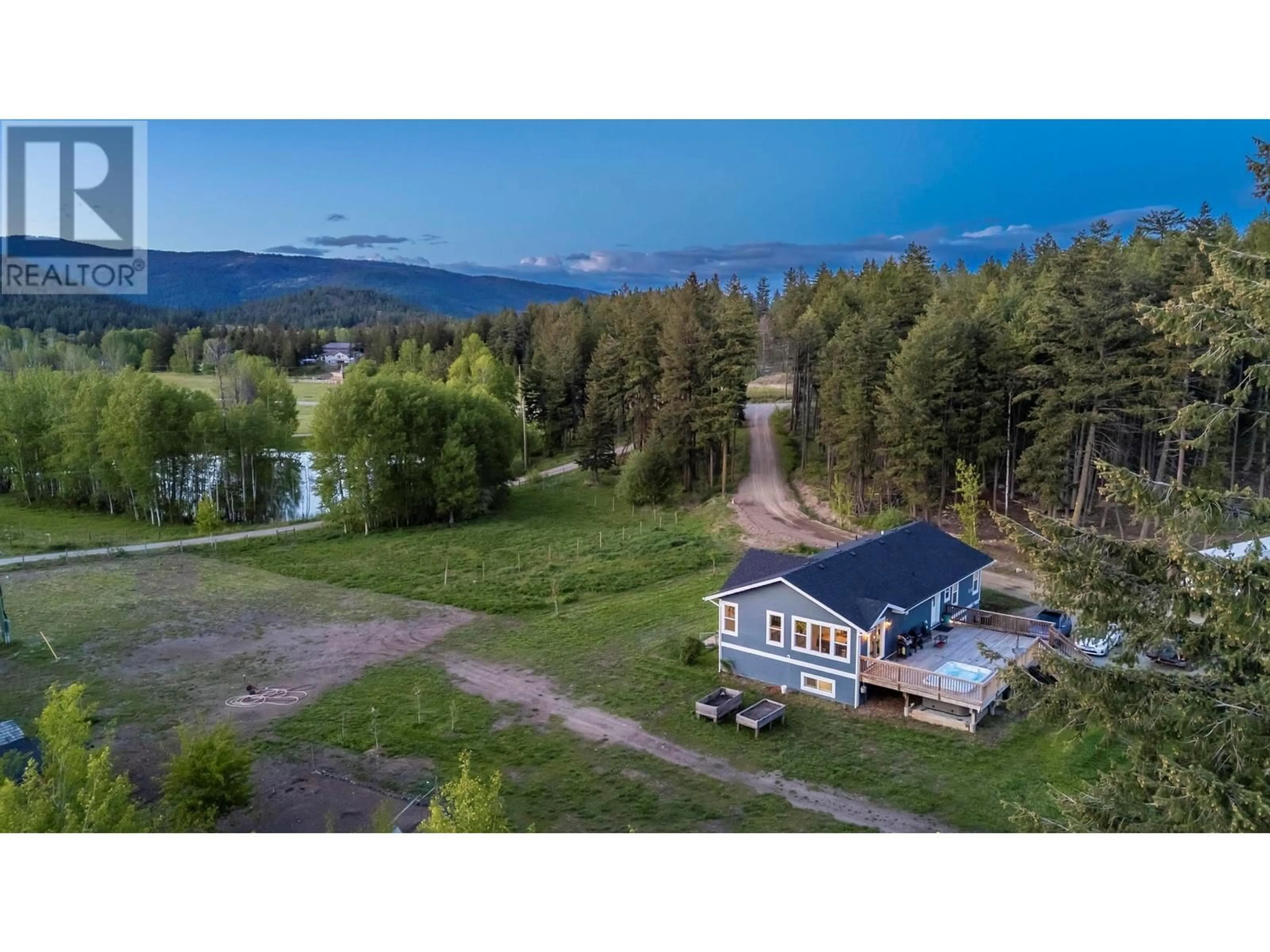 A pic from outside/outdoor area/front of a property/back of a property/a pic from drone, water/lake/river/ocean view for 3530 CARRE ROAD, West Kelowna British Columbia V4T1V9