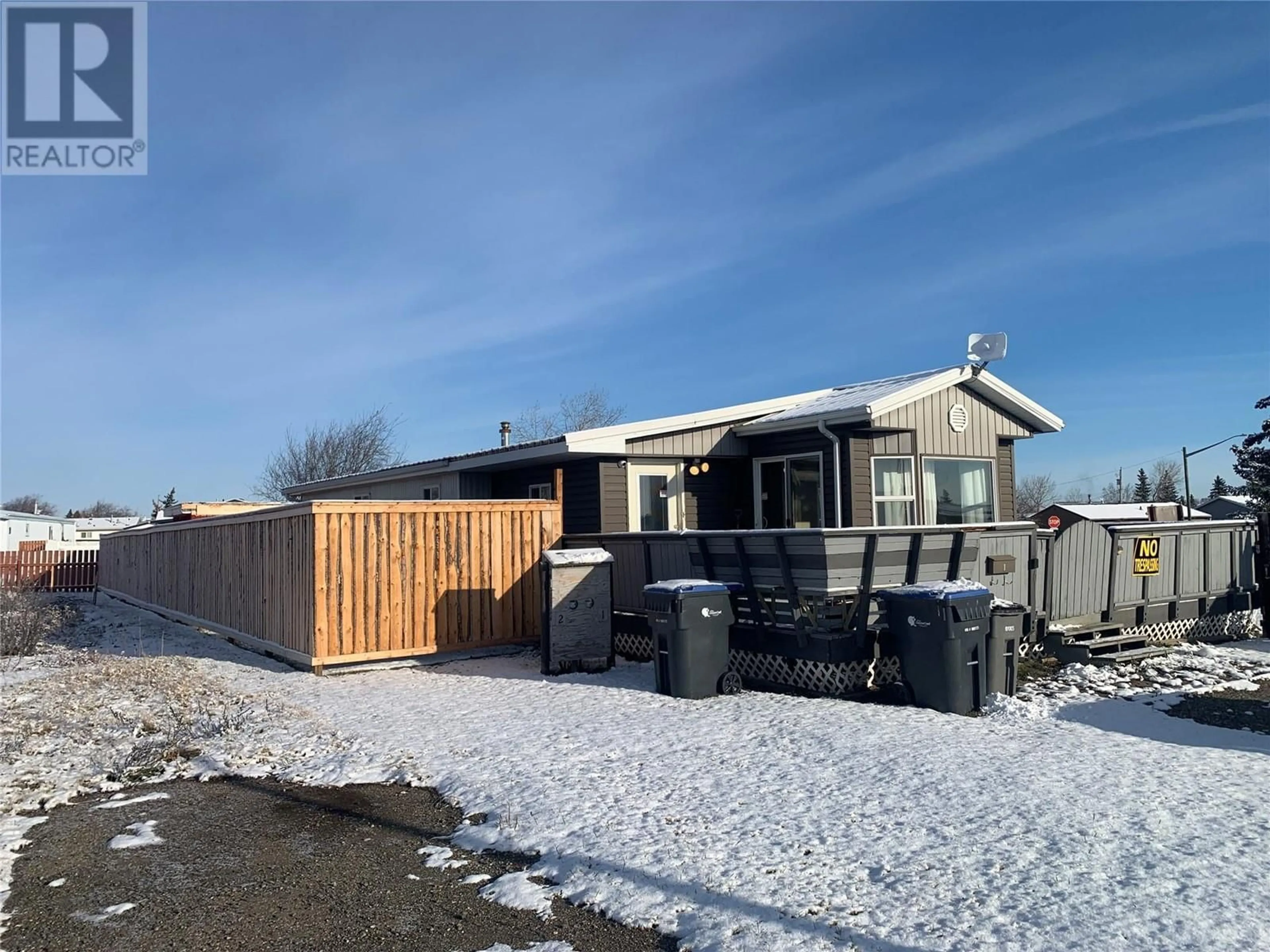 A pic from outside/outdoor area/front of a property/back of a property/a pic from drone, unknown for 1 - 1201 118 STREET, Dawson Creek British Columbia V1G4L2