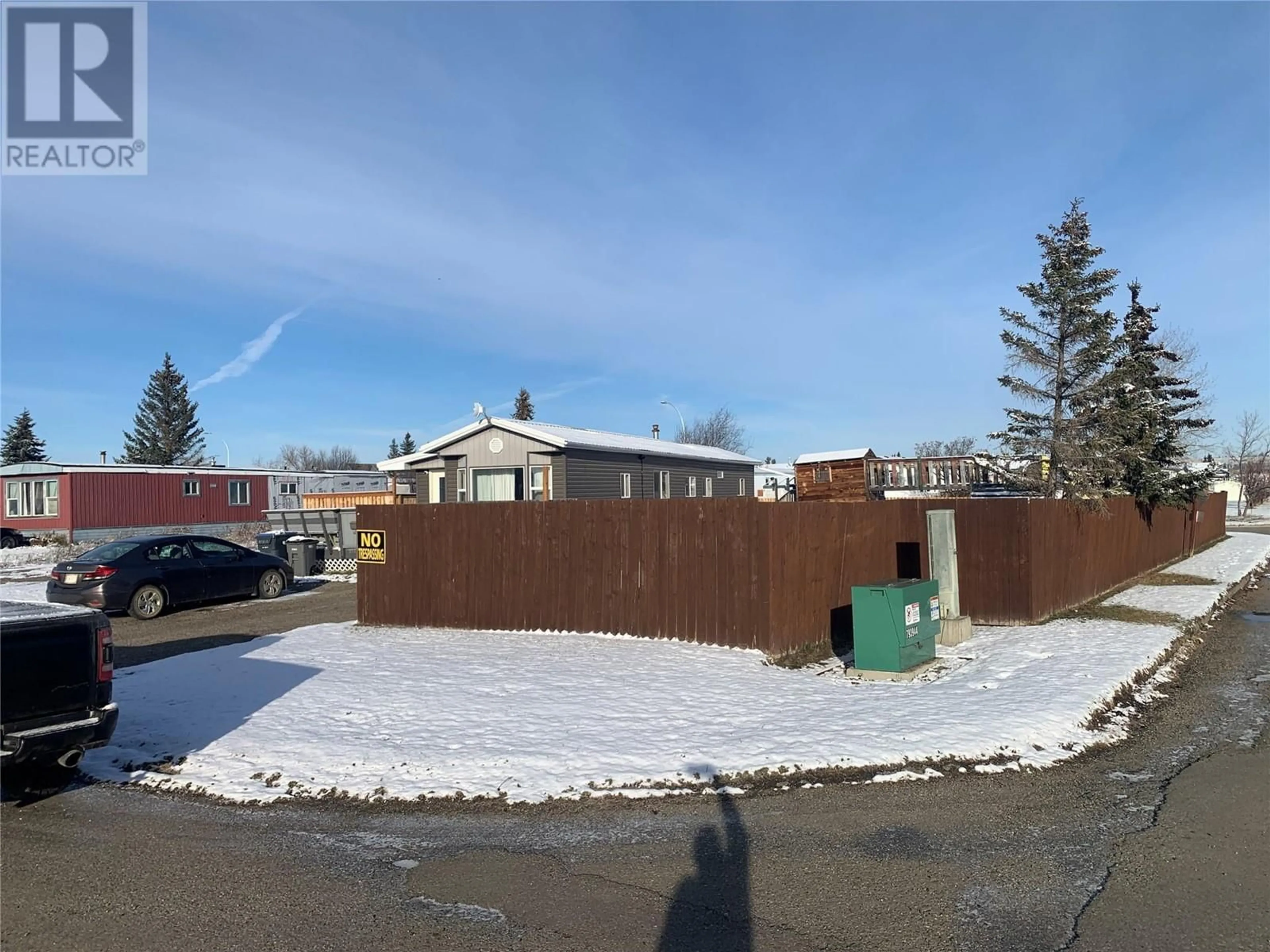 A pic from outside/outdoor area/front of a property/back of a property/a pic from drone, street for 1 - 1201 118 STREET, Dawson Creek British Columbia V1G4L2