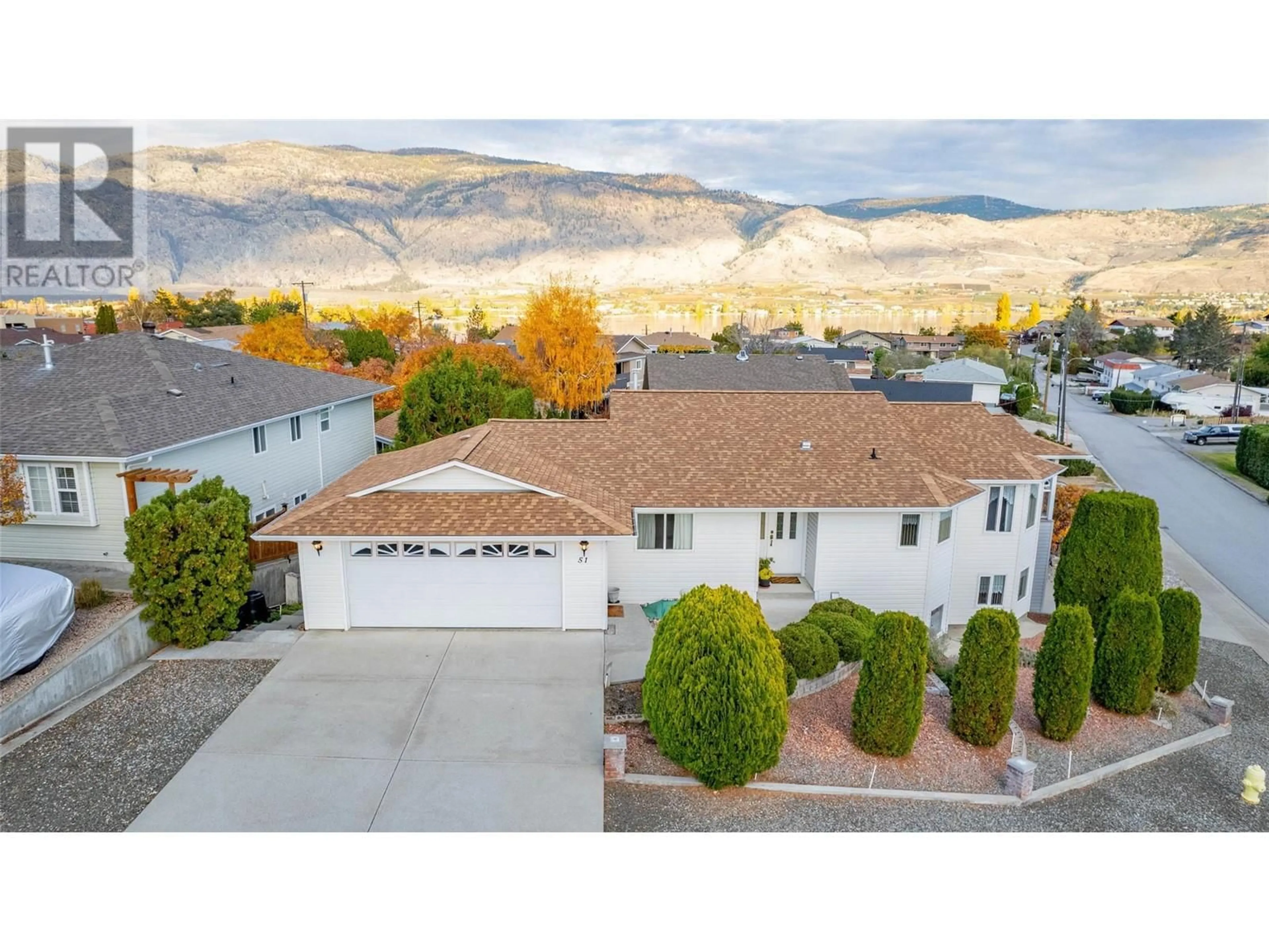 Frontside or backside of a home, the street view for 51 Cactus Crescent, Osoyoos British Columbia V0H1V1