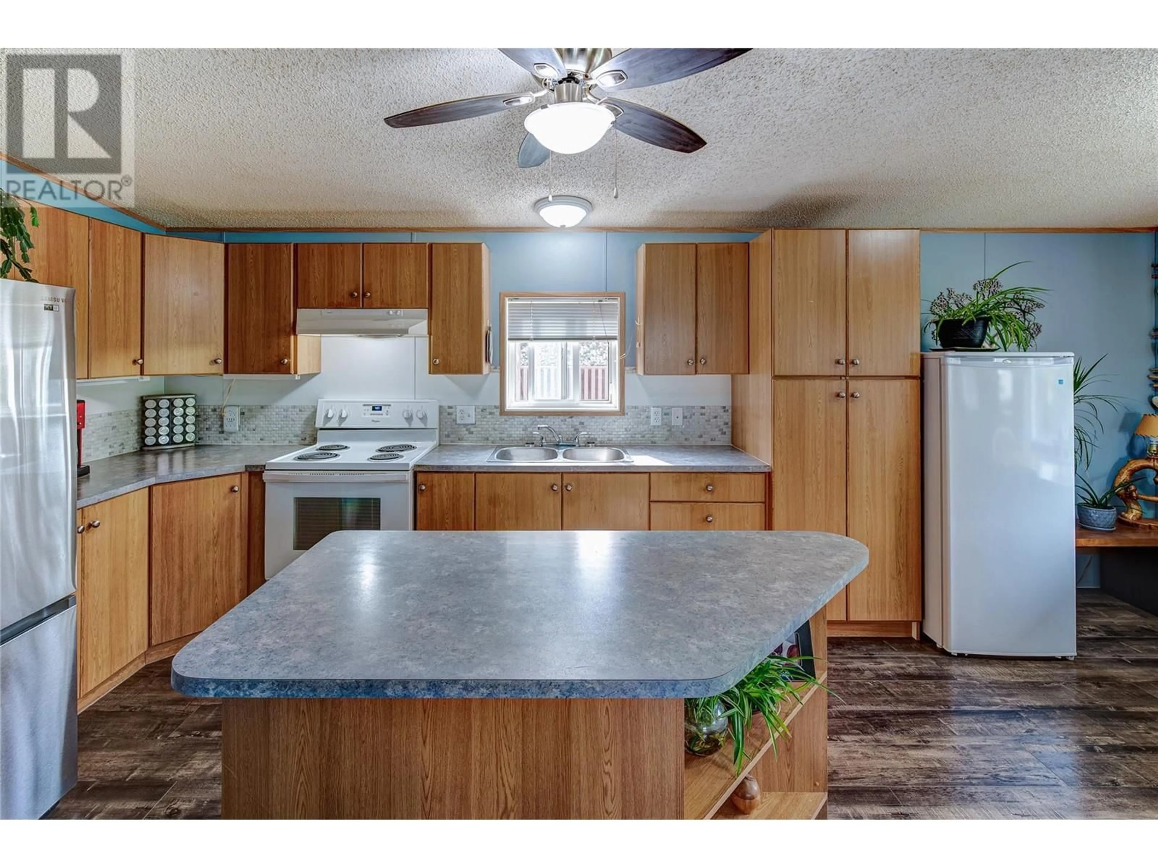 Open concept kitchen, unknown for 102 - 5155 CHUTE LAKE ROAD, Kelowna British Columbia V1W4R9