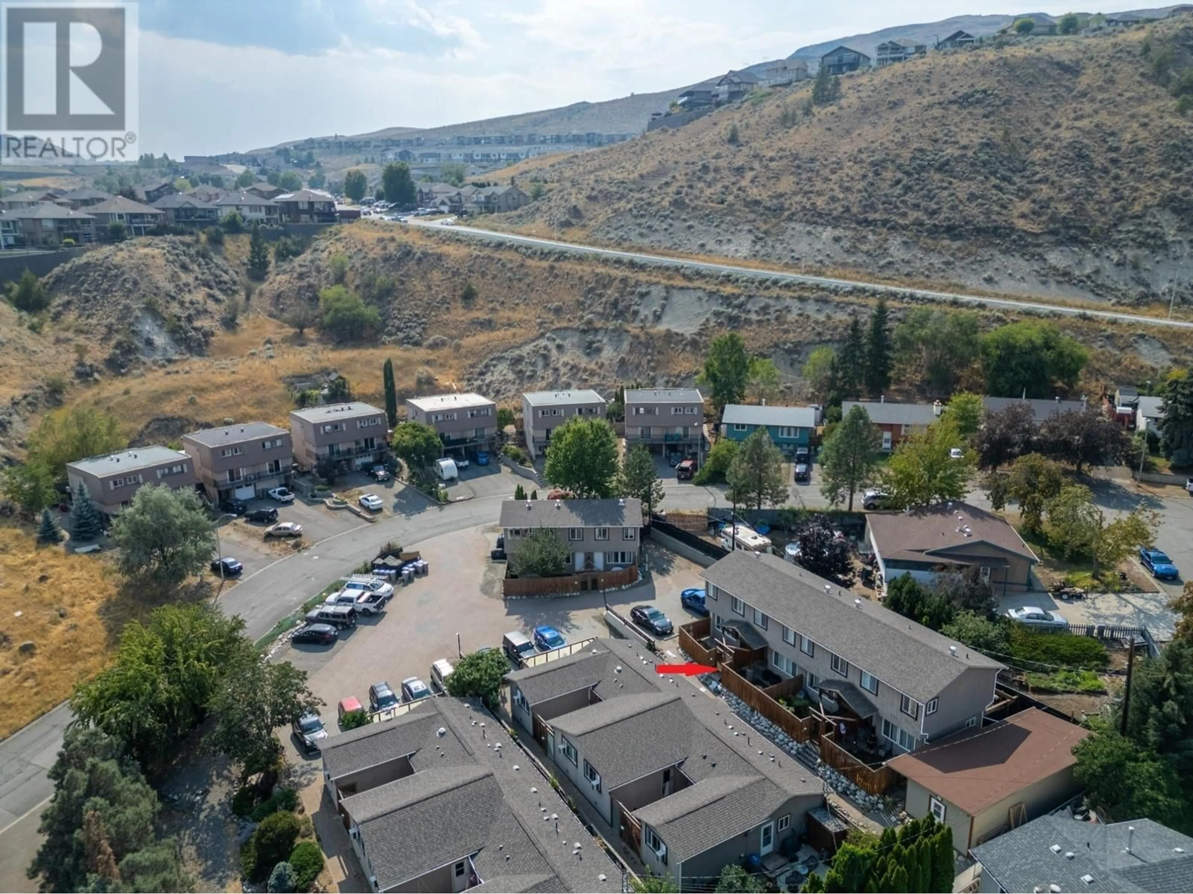 A pic from exterior of the house or condo, the street view for 870 MCQUEEN Drive Unit# 110, Kamloops British Columbia V2B7X9