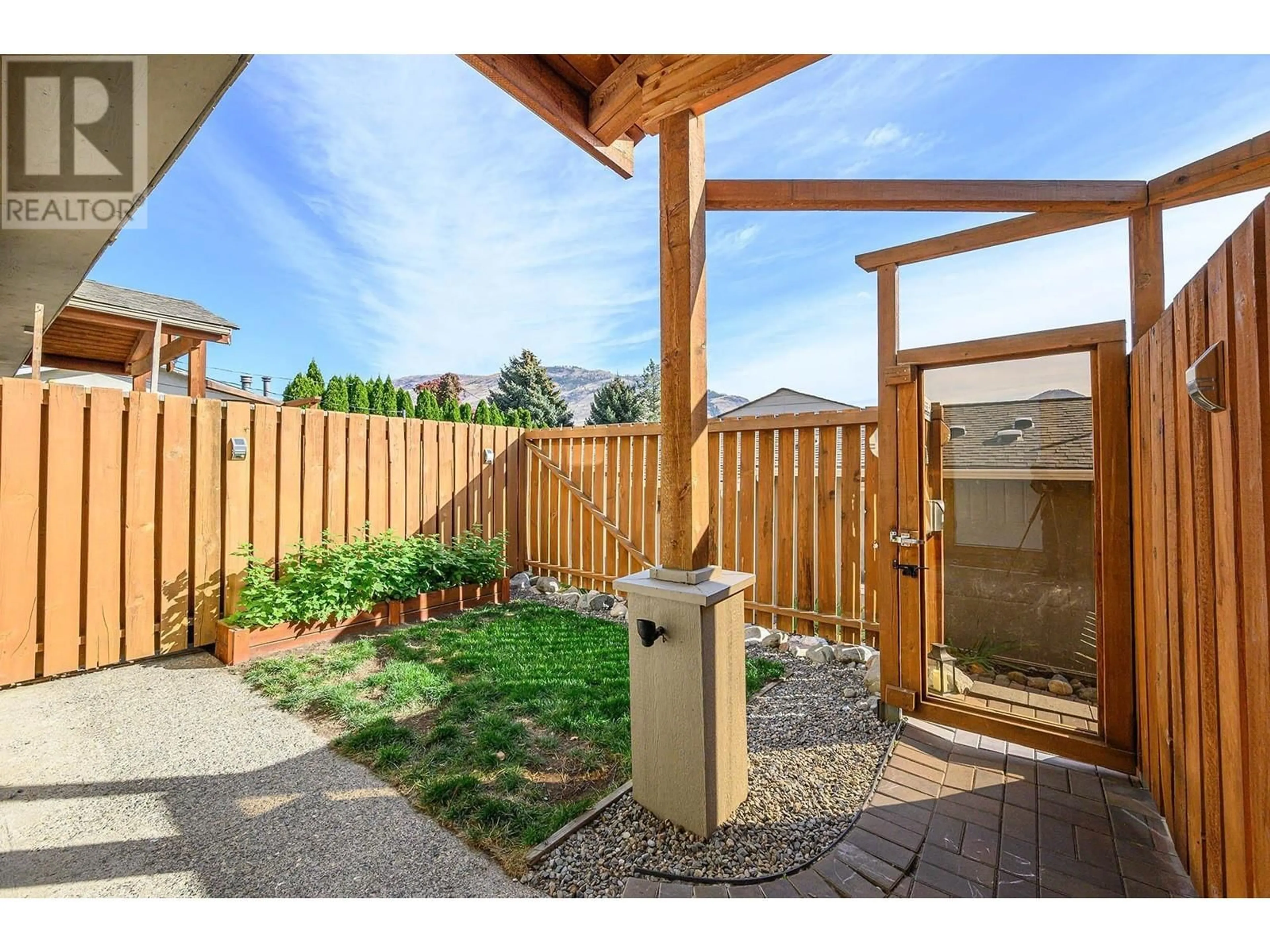 Patio, the fenced backyard for 870 MCQUEEN Drive Unit# 110, Kamloops British Columbia V2B7X9