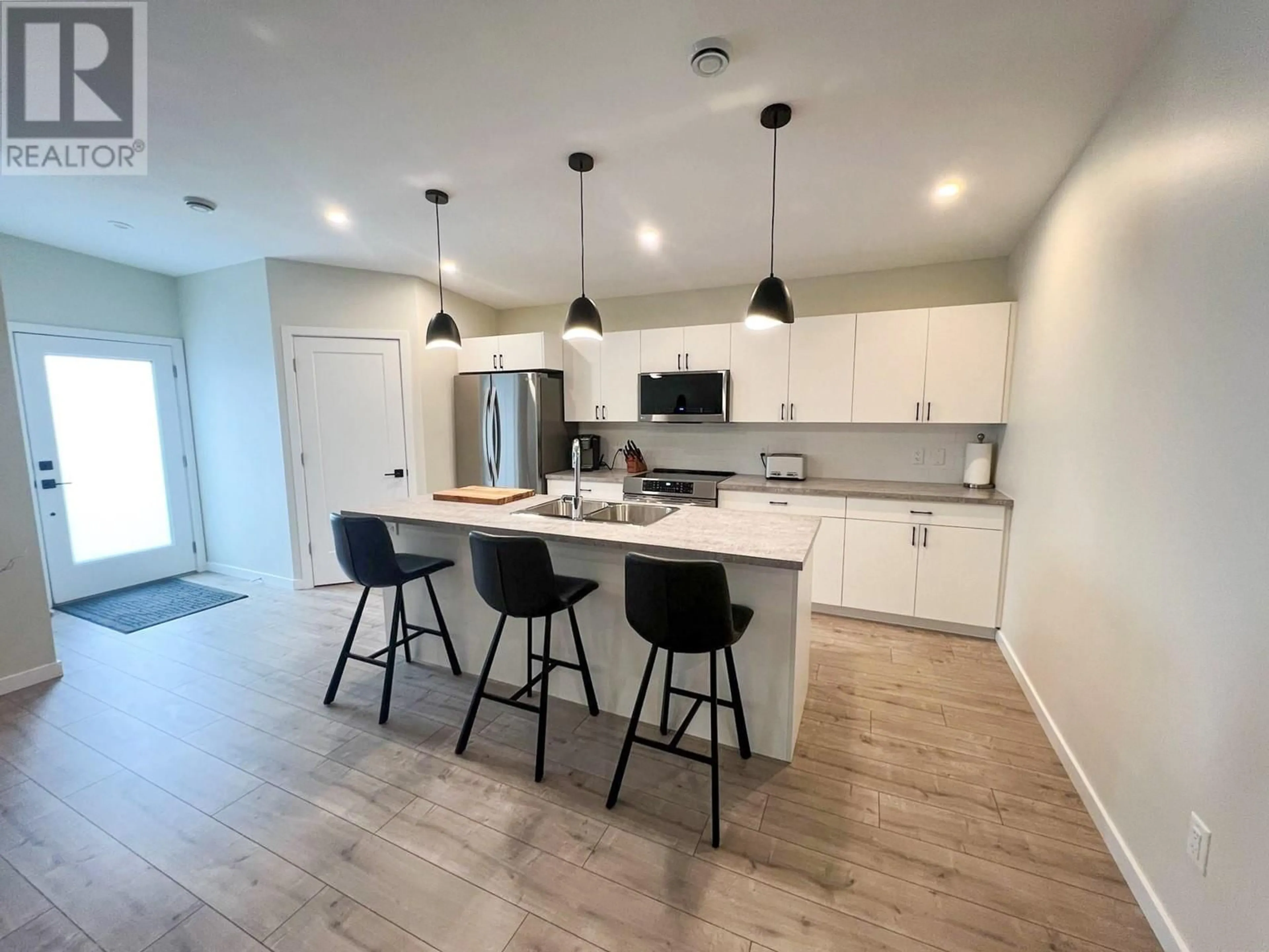 Open concept kitchen for 8900 Jim Bailey Road Unit# 45, Kelowna British Columbia V4V0B5