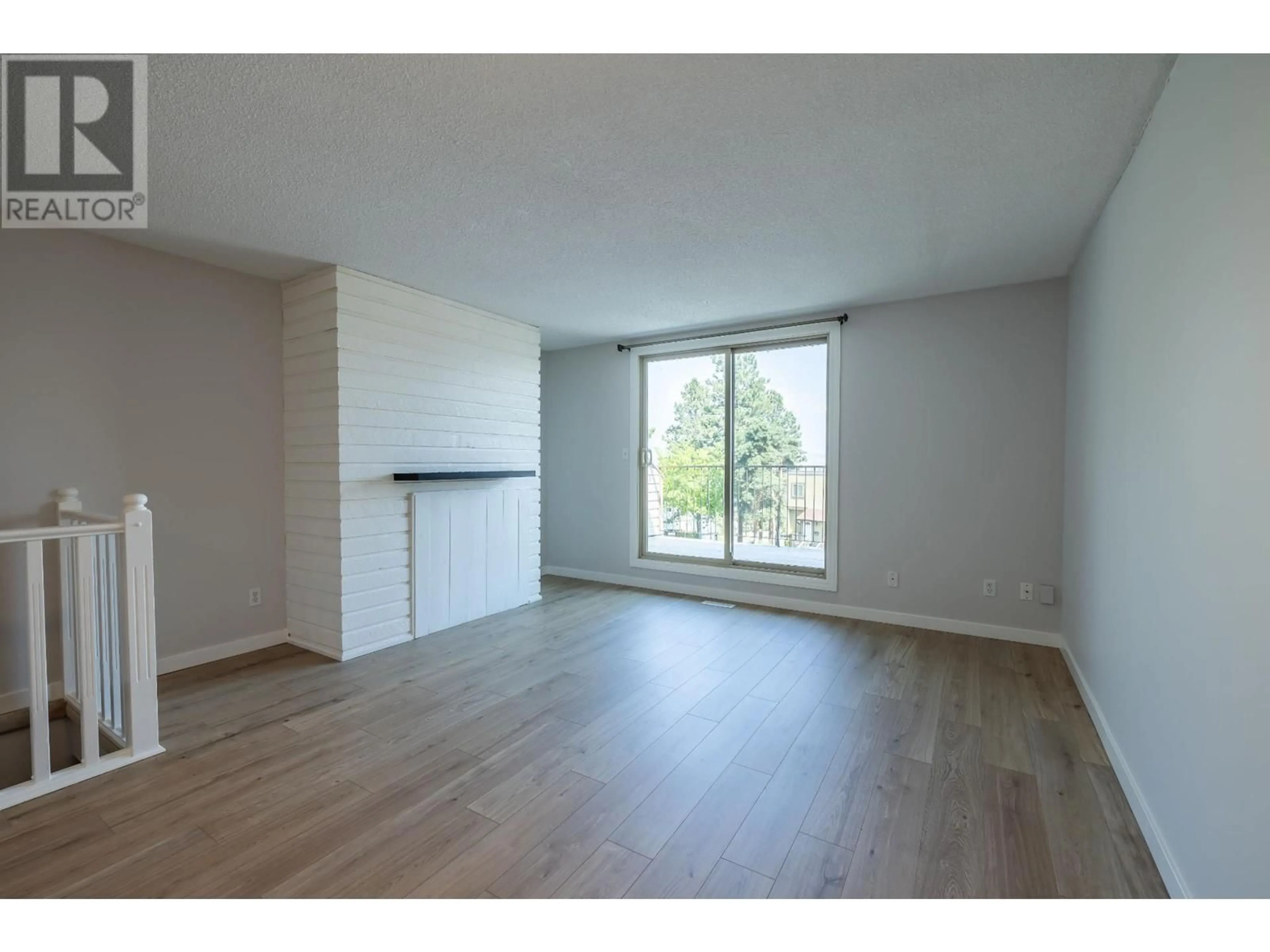 A pic of a room, wood floors for 1750 Summit Drive Unit# 50, Kamloops British Columbia V2E1Y1